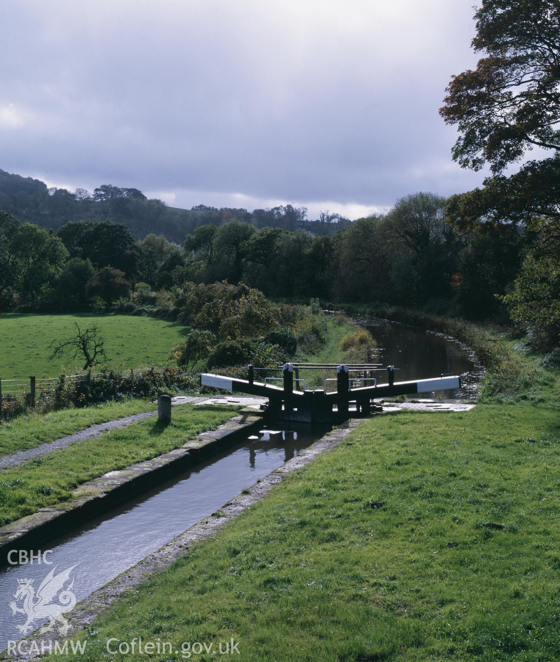 Colour transparency showing a view of Burgedin Lock on the Montgomeryshire Canal, produced by Iain Wright 1980