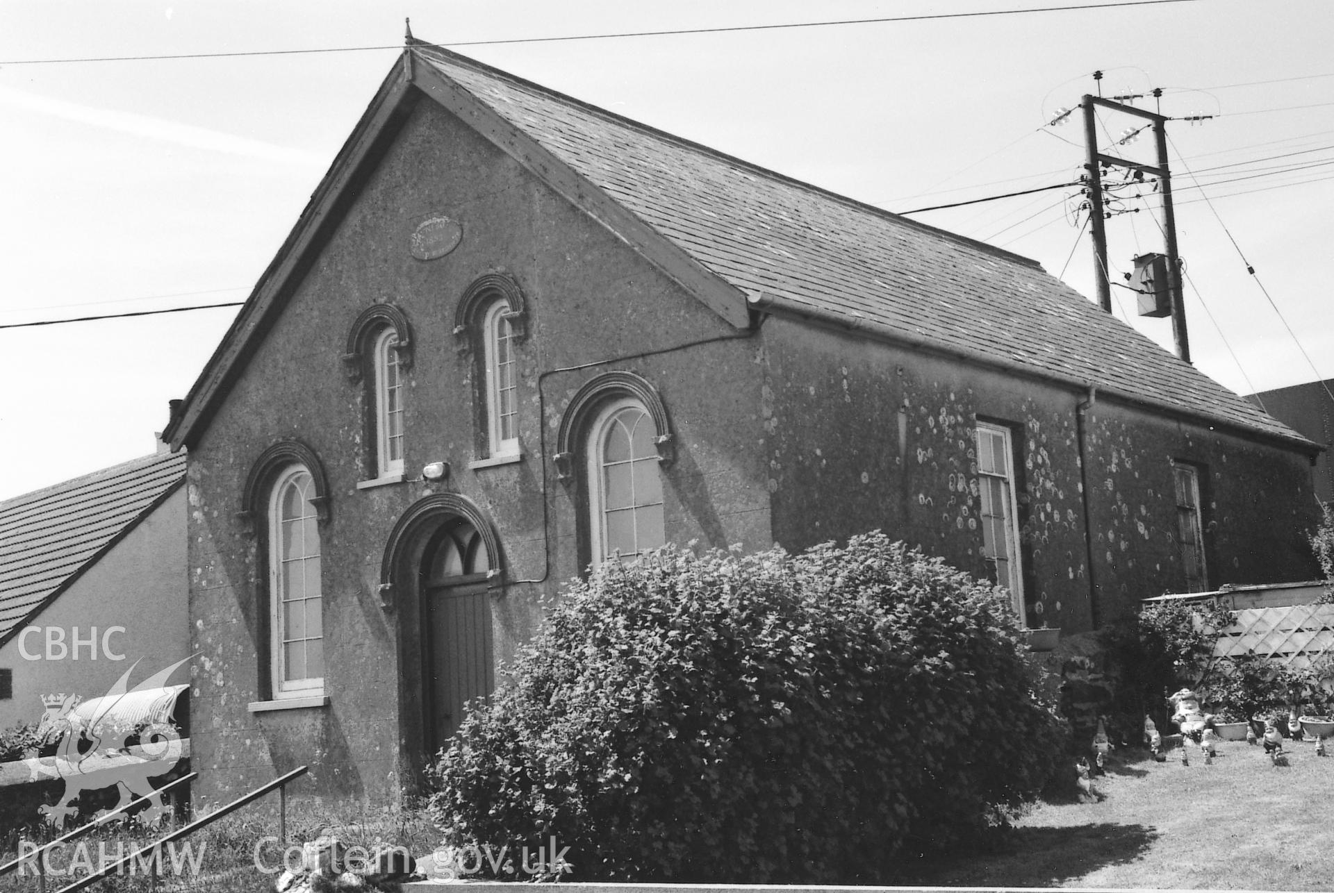 Digital copy of a black and white photograph showing an exterior view of Rehoboth Congregational Chapel, Mathry, taken by Robert Scourfield, 1995.