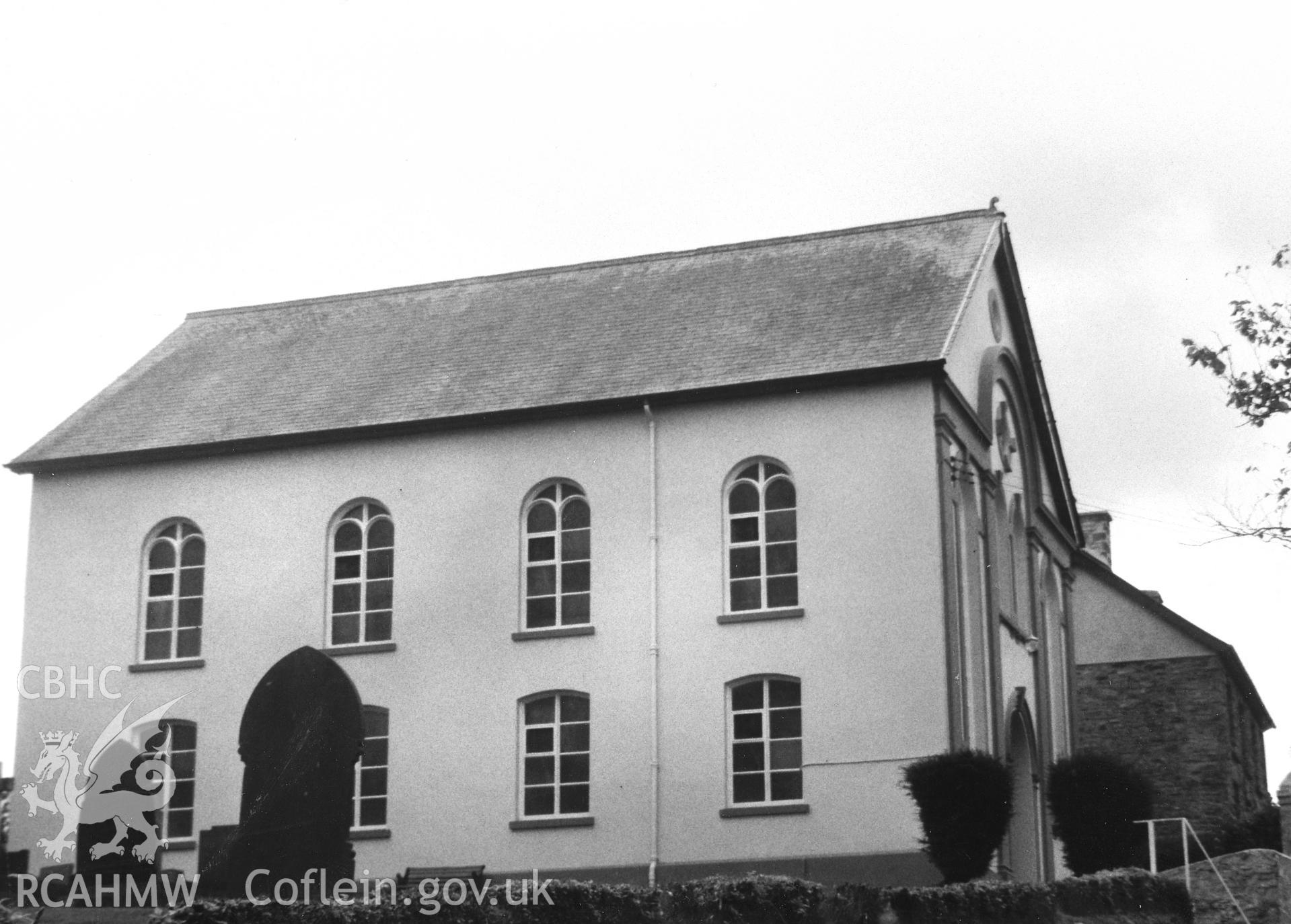 Digital copy of a black and white photograph showing an exterior view of Gwernllwyn Independent Chapel, Llandyfriog, taken by Robert Scourfield, 1995.