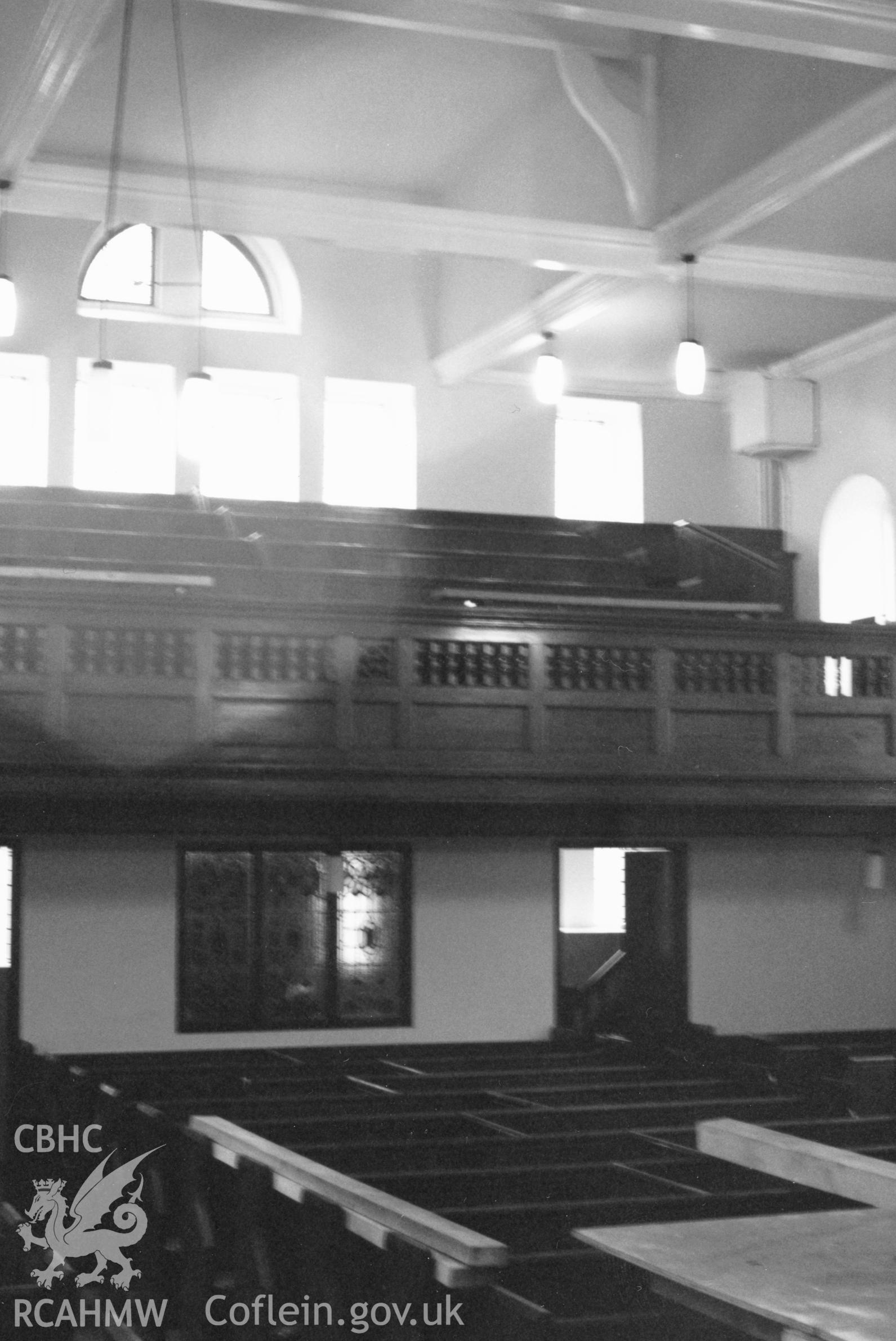 Digital copy of a black and white photograph showing interior view of Galilee Baptist Chapel, Llangwm, taken by Robert Scourfield, 1996.