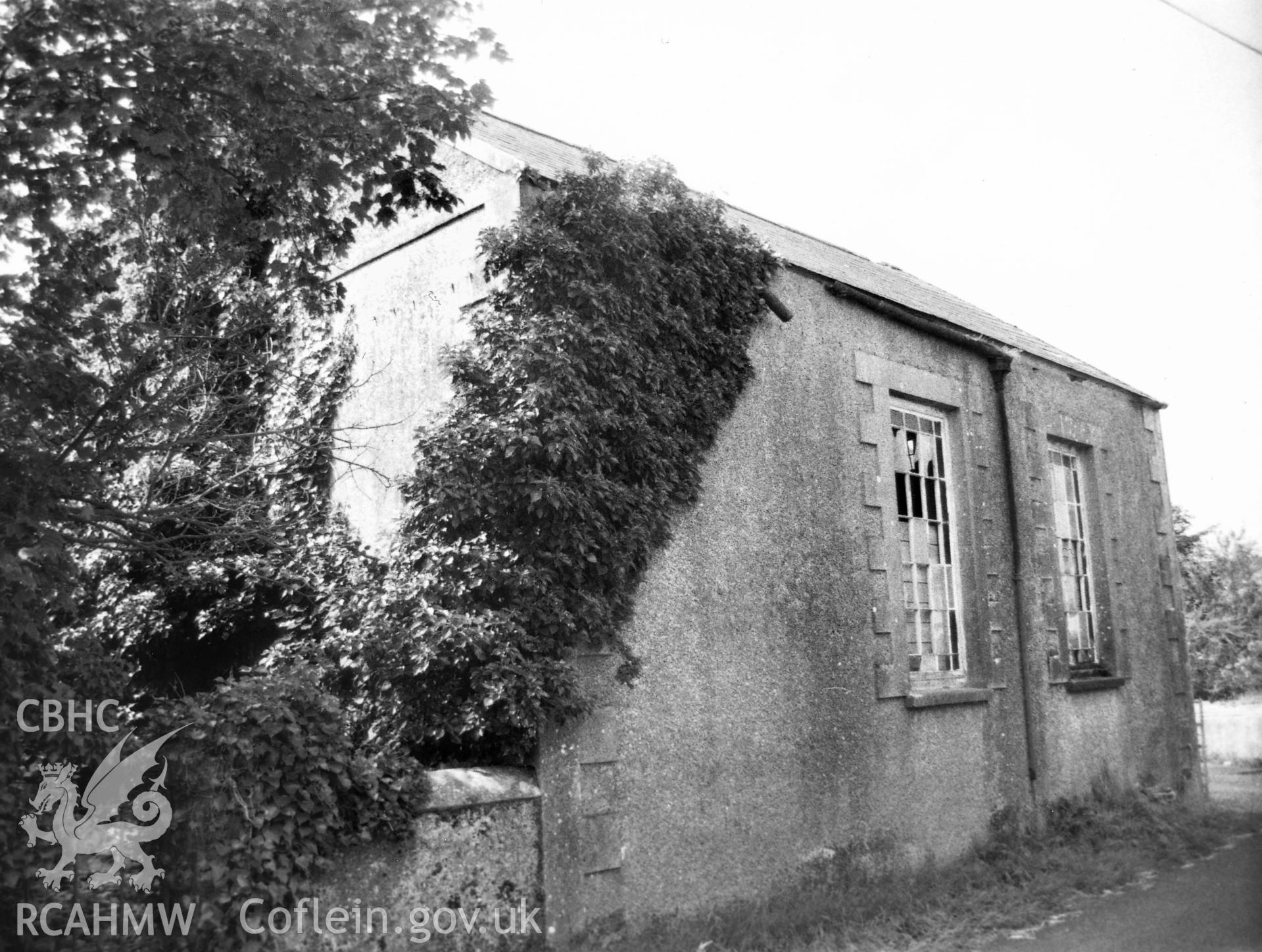 Digital copy of a black and white photograph showing an exterior view of Manorbier Newton Congregational Chapel,  taken by Robert Scourfield, 1995.