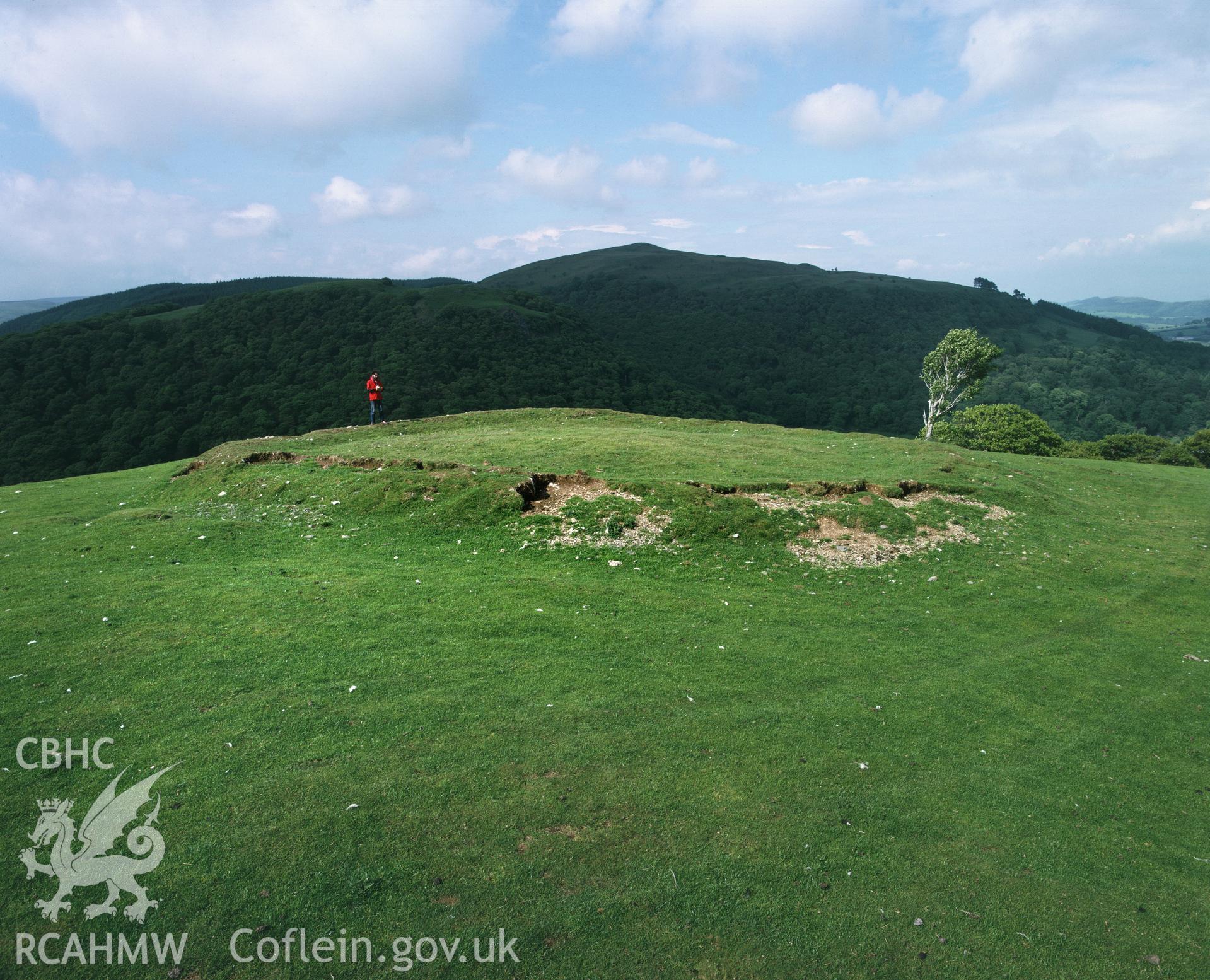 Colour transparency showing a view of possible cairn at Pen Twr, produced by Iain Wright, c.1981.