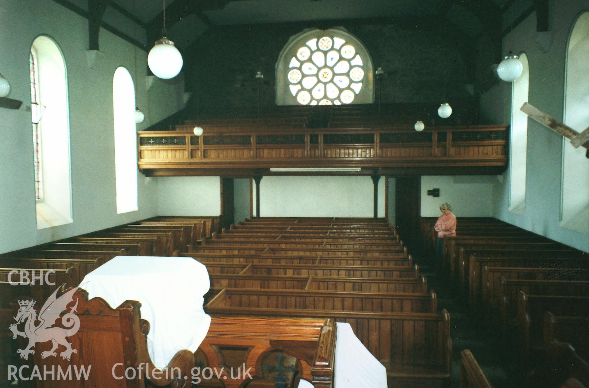 Digital copy of a colour photograph showing an interior view of Laugharne Congregational Chapel,  taken by Robert Scourfield, 1995.