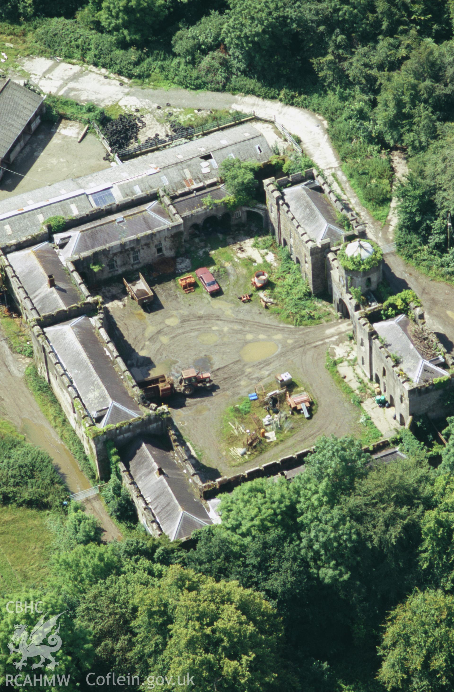 Slide of RCAHMW colour oblique aerial photograph of New Stable Court, Picton Castle, taken by Toby Driver, 2004.