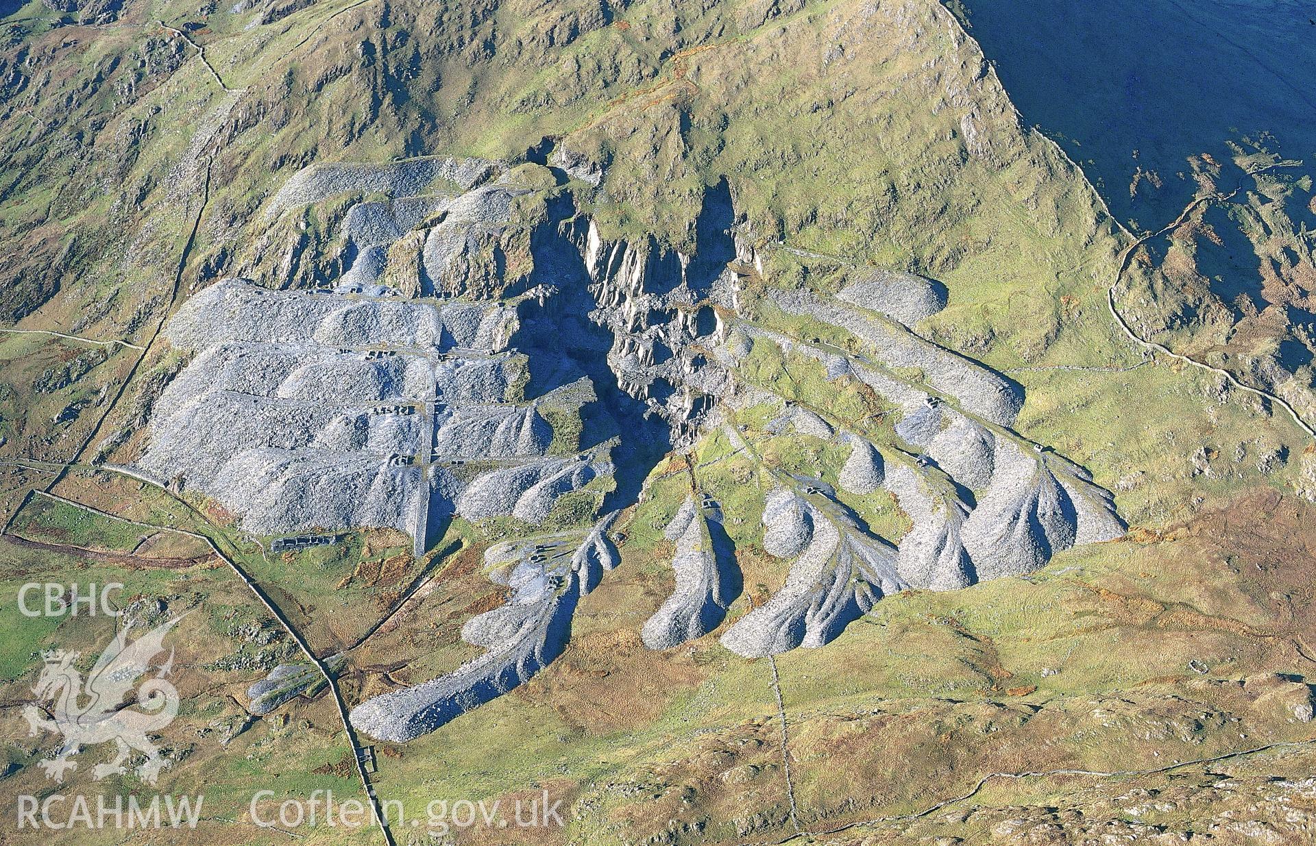 RCAHMW colour slide oblique aerial photograph of Gorseddau Slate Quarry, Dolbenmaen, taken by C.R.Musson on the 30/03/1996