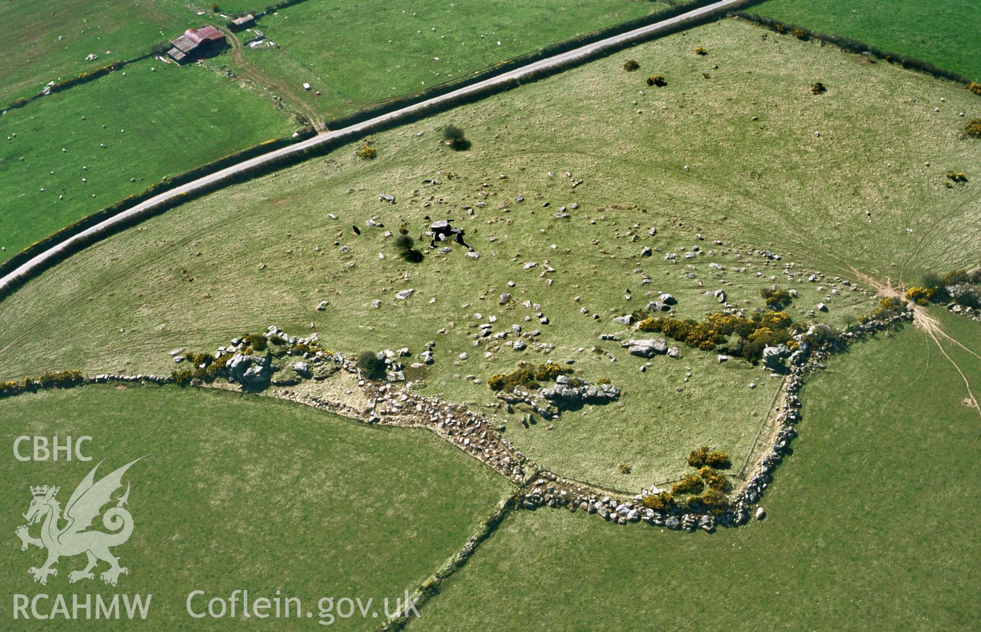 RCAHMW colour slide aerial photograph of Garn Turne, chambered tomb. Taken by Toby Driver on 10/04/2003