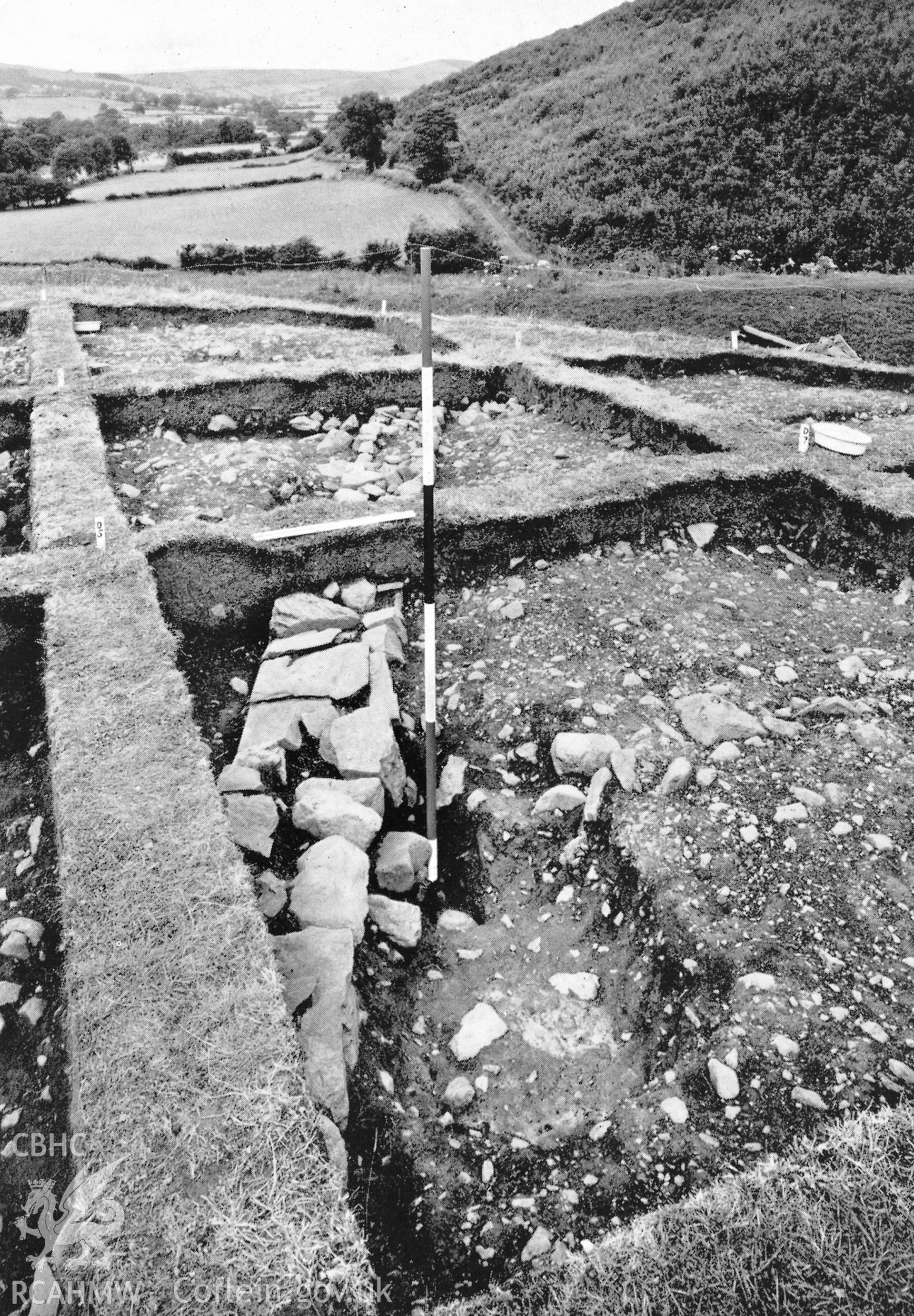 View of excavations on the motte of Sycharth Castle in 1963, showing sleeper wall forming east side of hall or west building. From D.B.Hague Sycharth Collection.