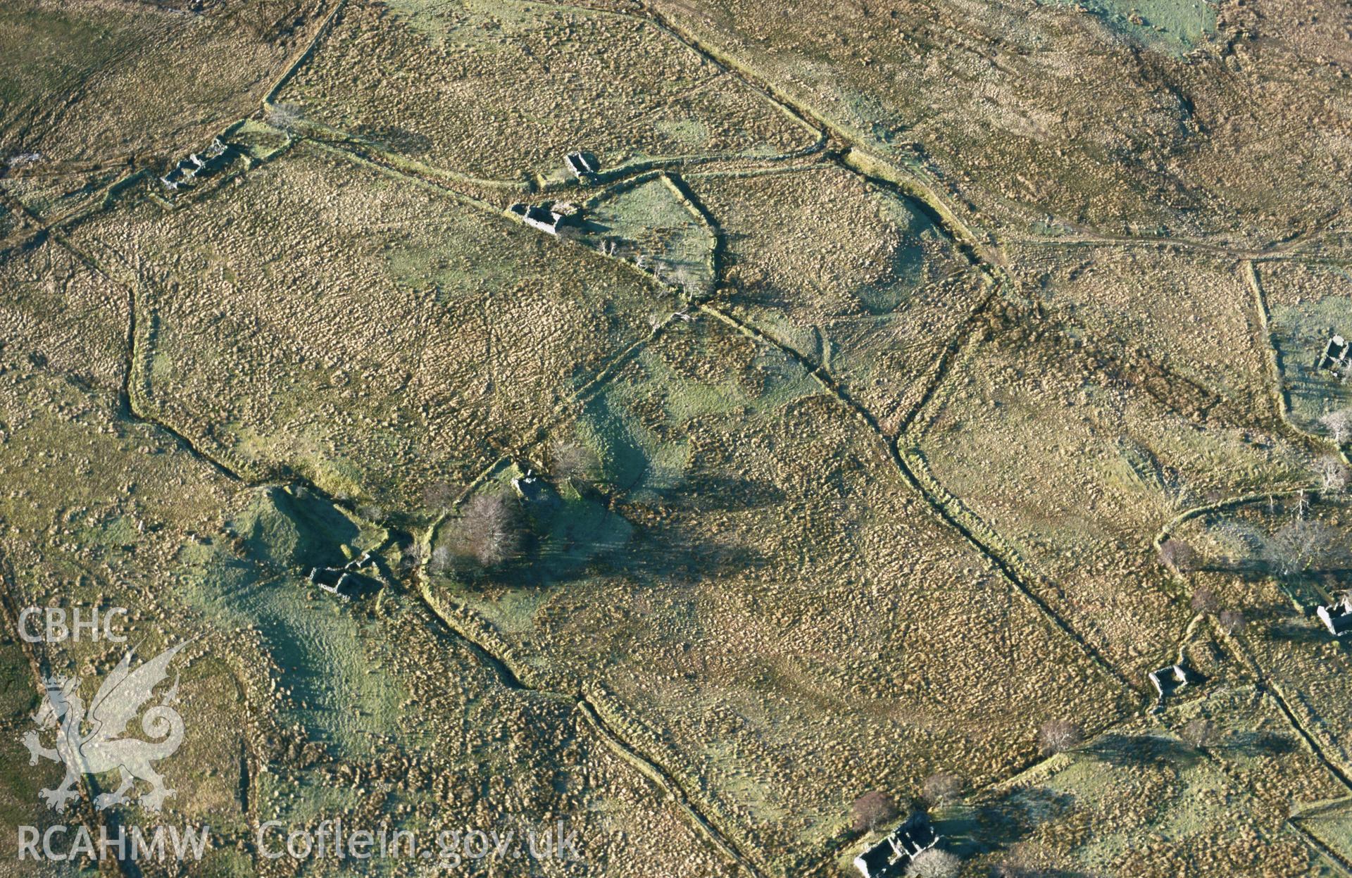 Slide of RCAHMW colour oblique aerial photograph of the squatter settlement at Bryngwyn , taken by T.G. Driver, 2001.