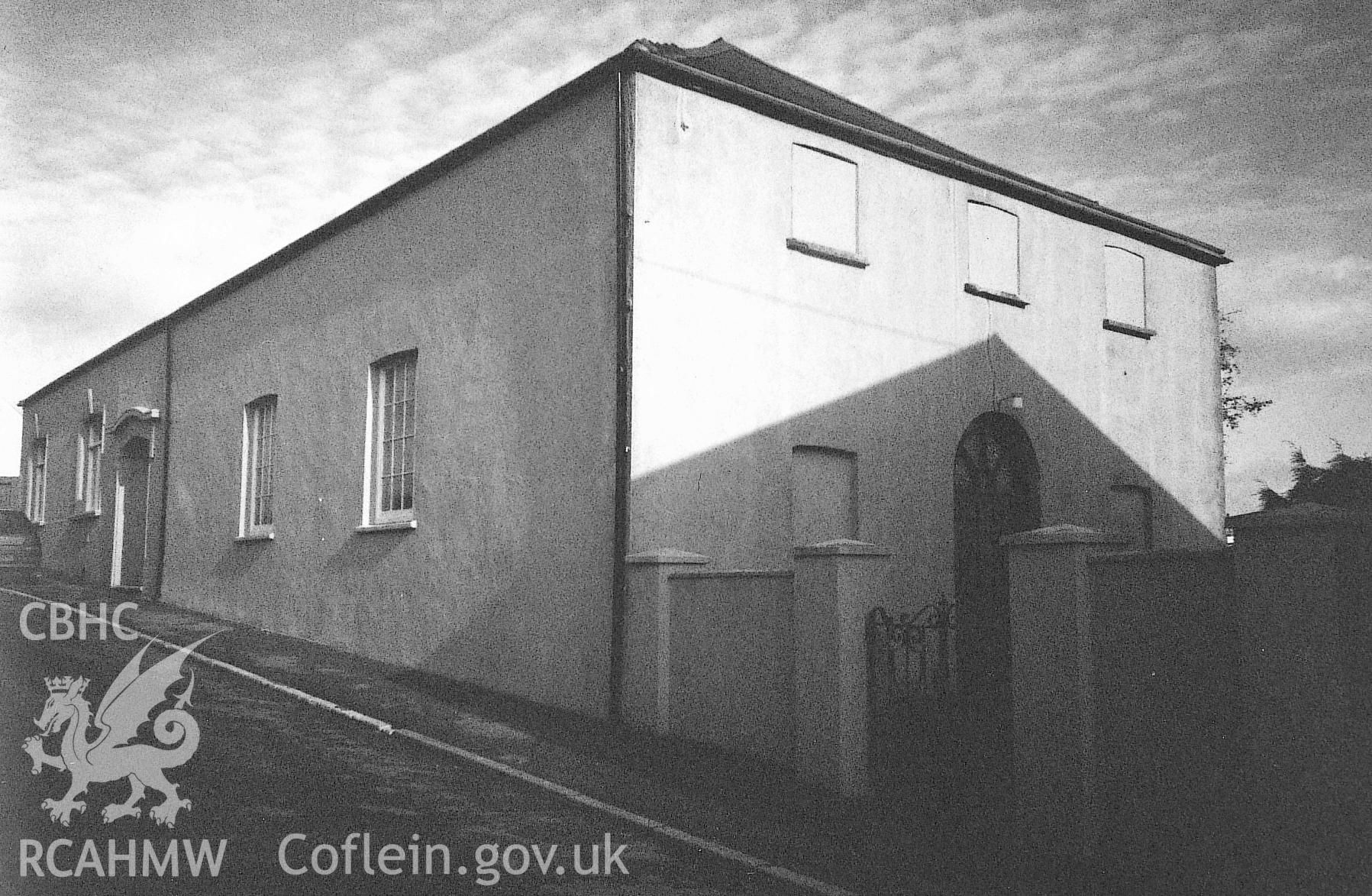 Digital copy of a black and white photograph showing an exterior view of Hakin Point Wesleyan Chapel, Milford Haven, taken by Robert Scourfield, 1995.