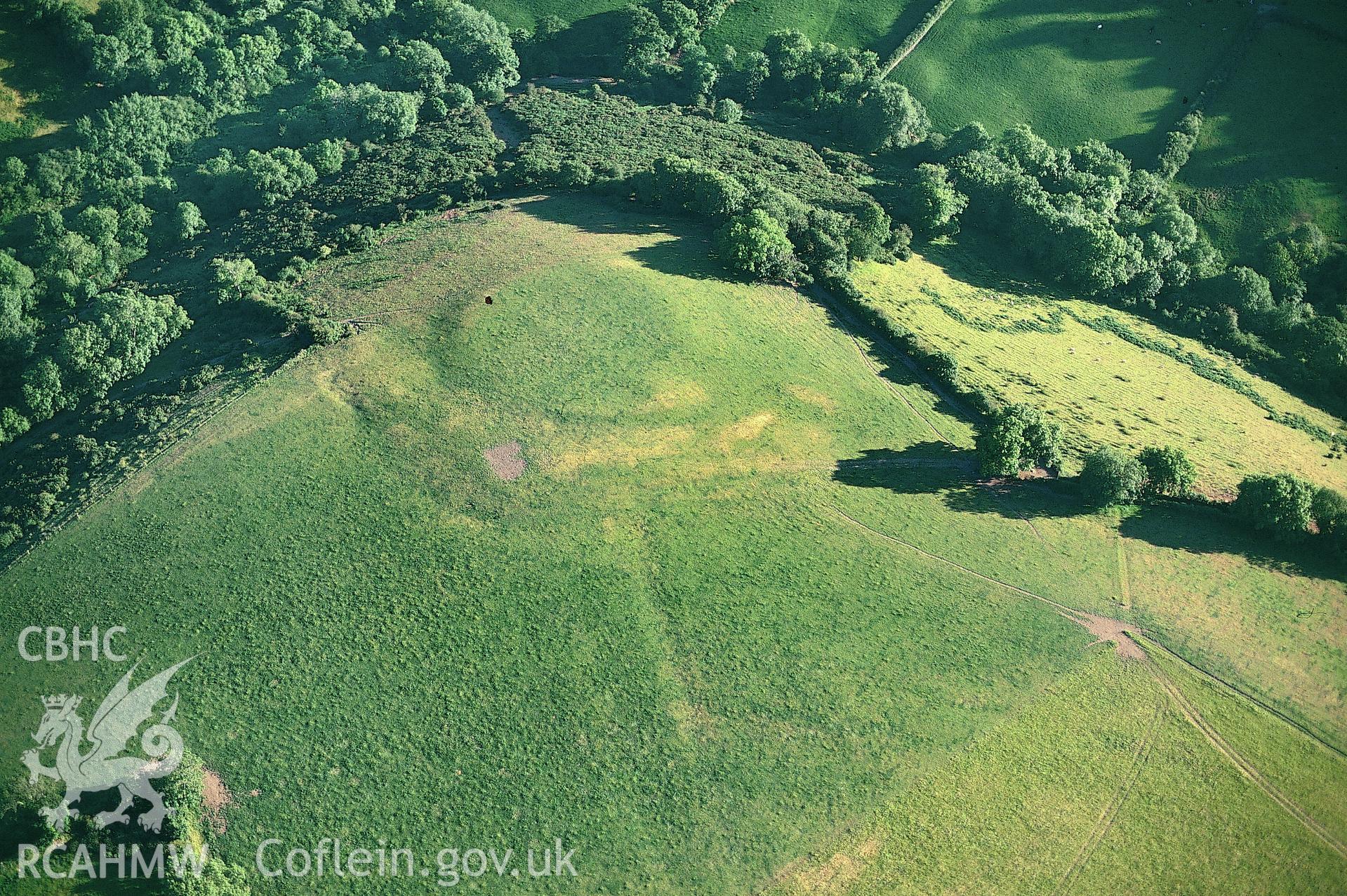 Slide of RCAHMW colour oblique aerial photograph of Gaer Enclosure, Parcycastell, Beulah, taken by Toby Driver, 1996.
