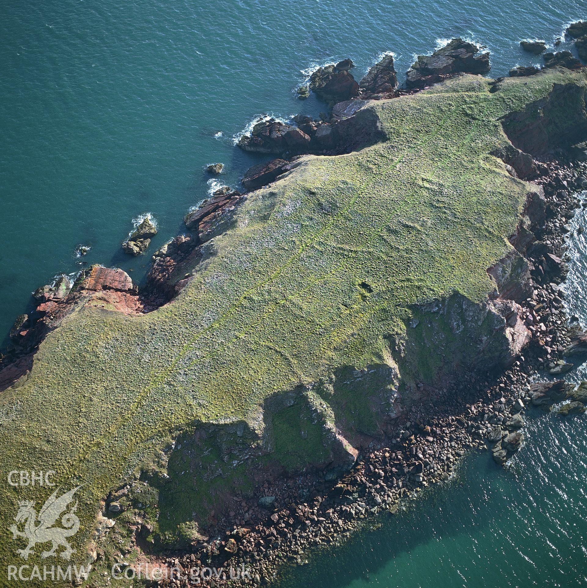 RCAHMW colour oblique aerial photograph of Gateholm Island, Marloes And St Brides, taken by C.R. Musson, 1990