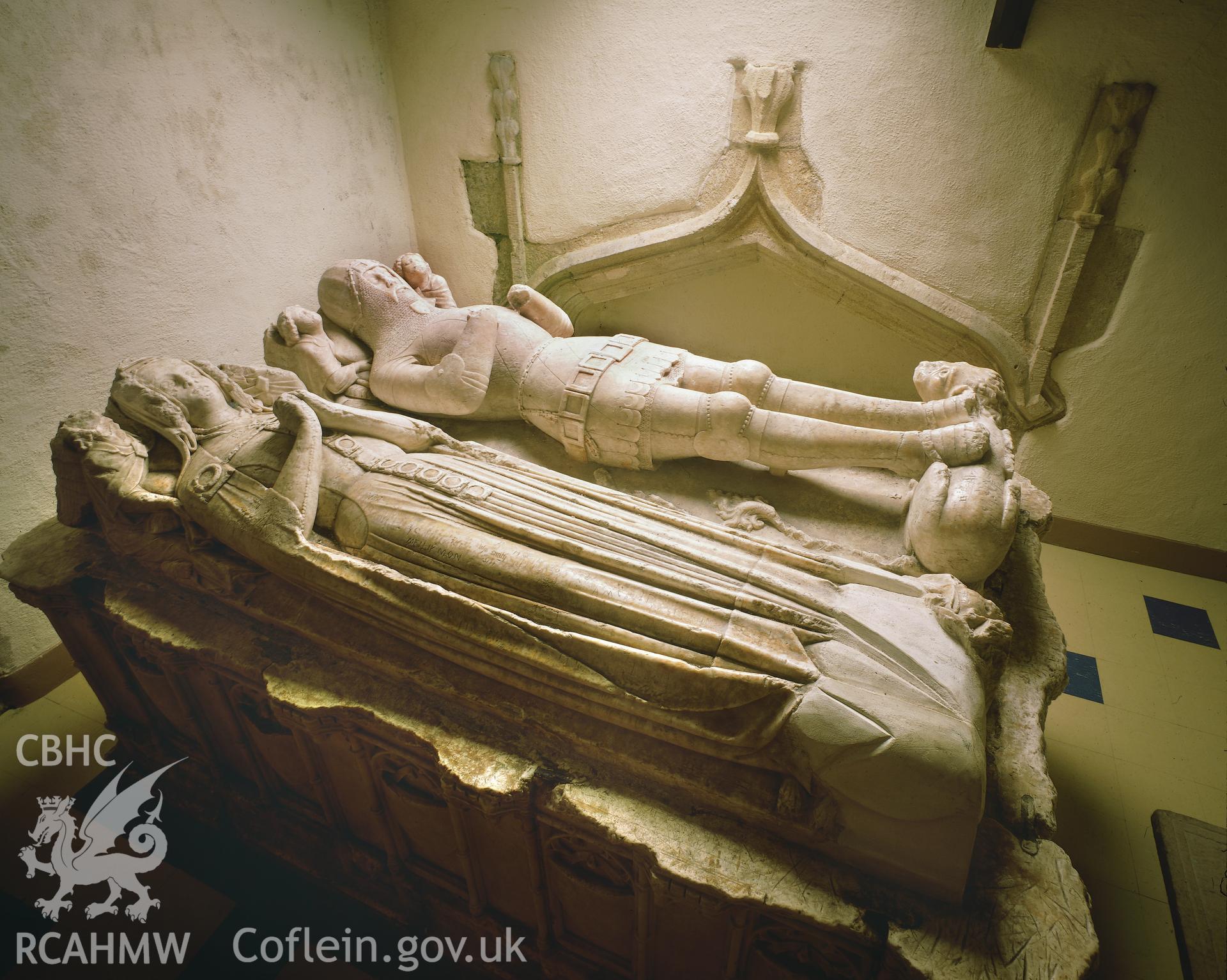 RCAHMW colour transparency showing view of an alabaster tomb in St Gredifael's Church, Penmynydd.