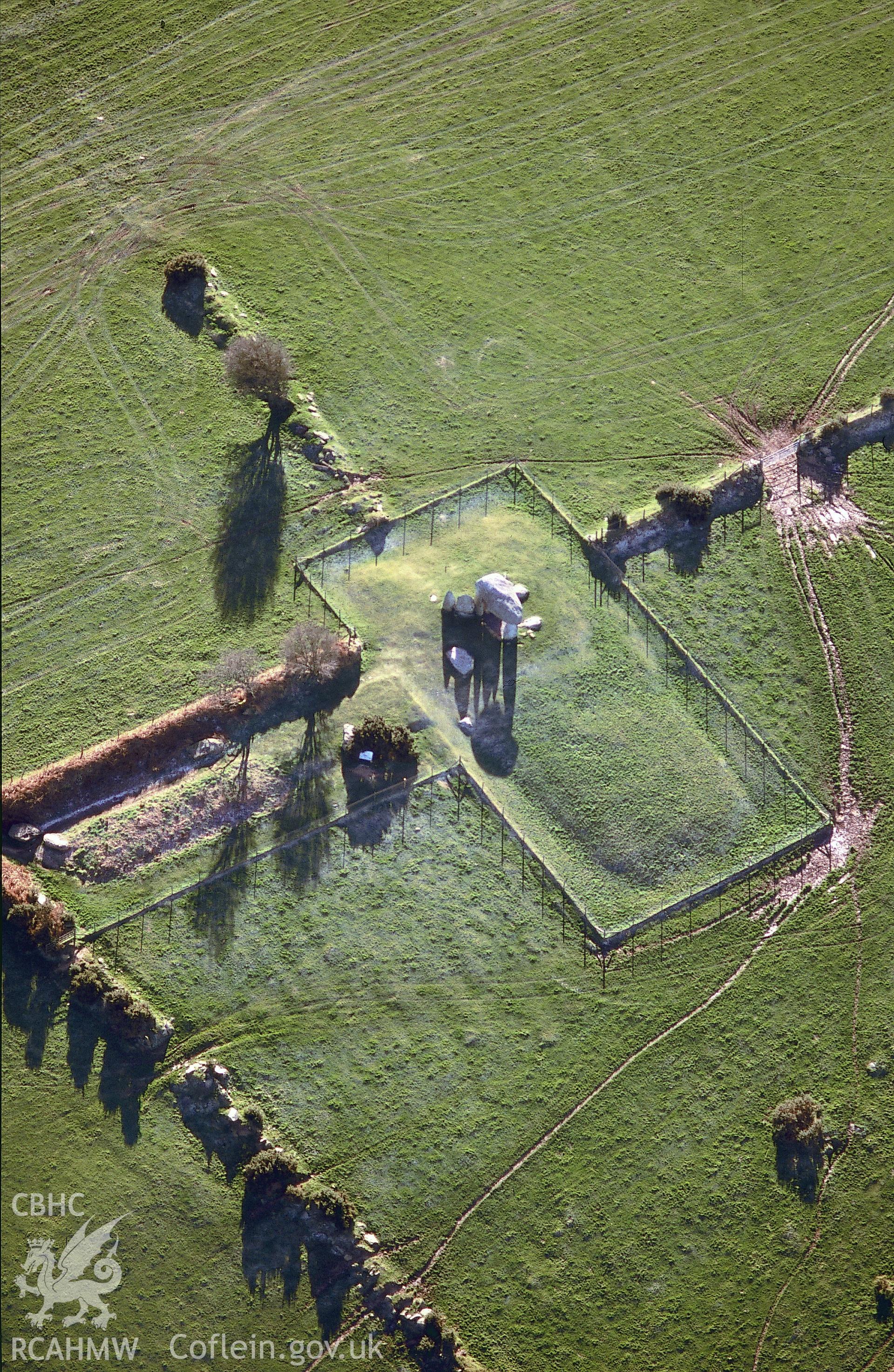 Slide of RCAHMW colour oblique aerial photograph of Pentre Ifan Burial Chamber, taken by Toby Driver, 2004.