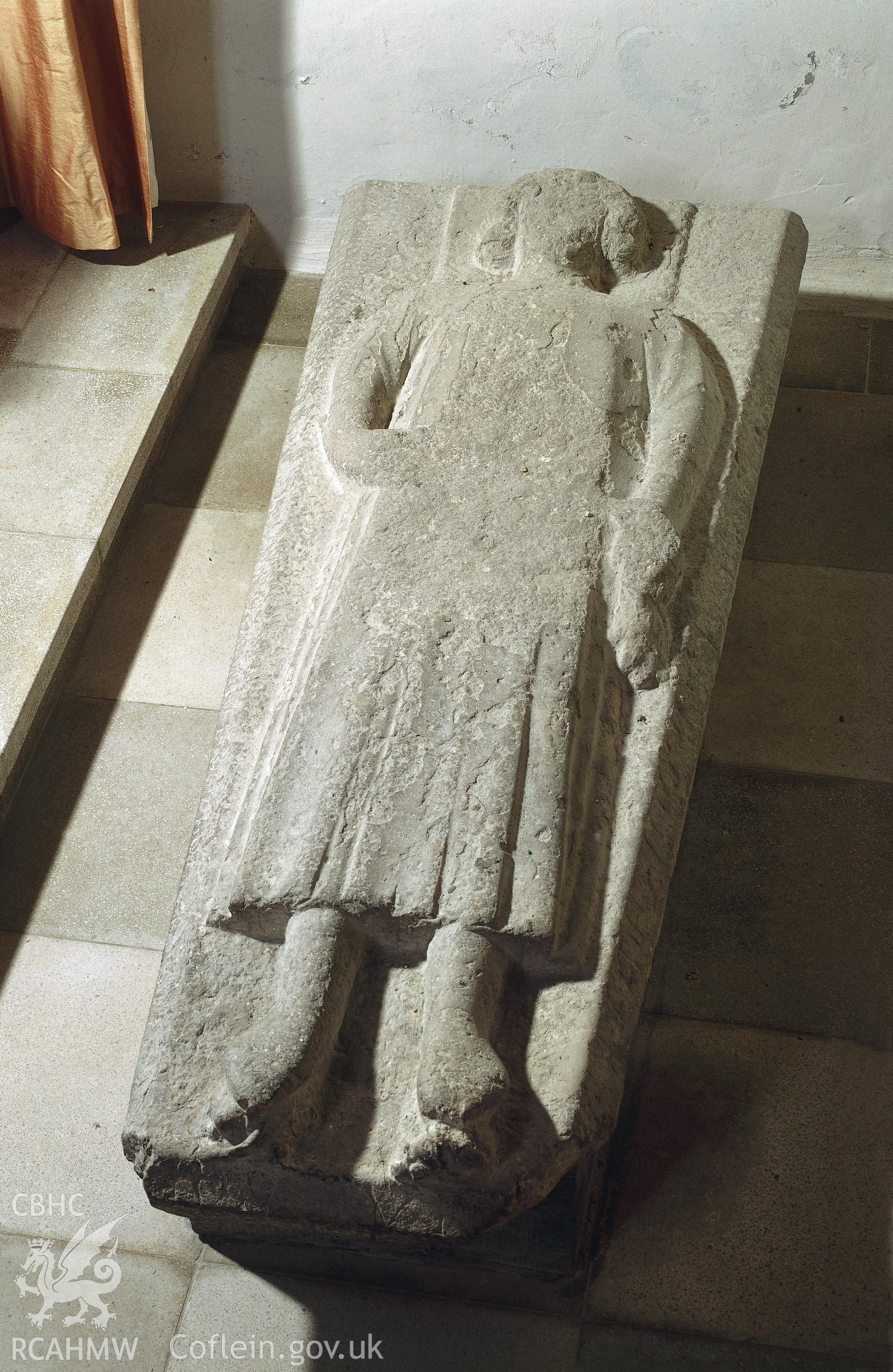 RCAHMW colour transparency showing detail of a male effigy, in St Mary's Church, Kidwelly.