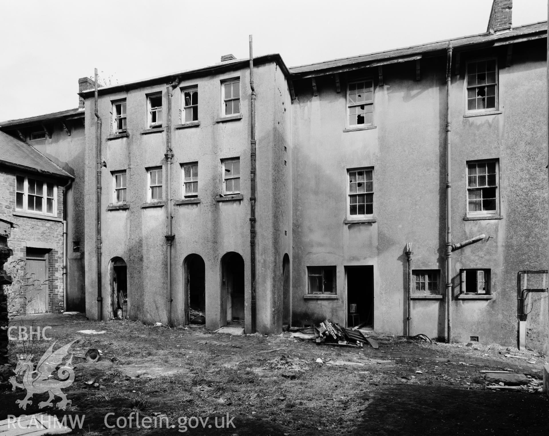 Black and white RCAHMW photograph of a general exterior view of Penlan Workhouse, Carmarthen.