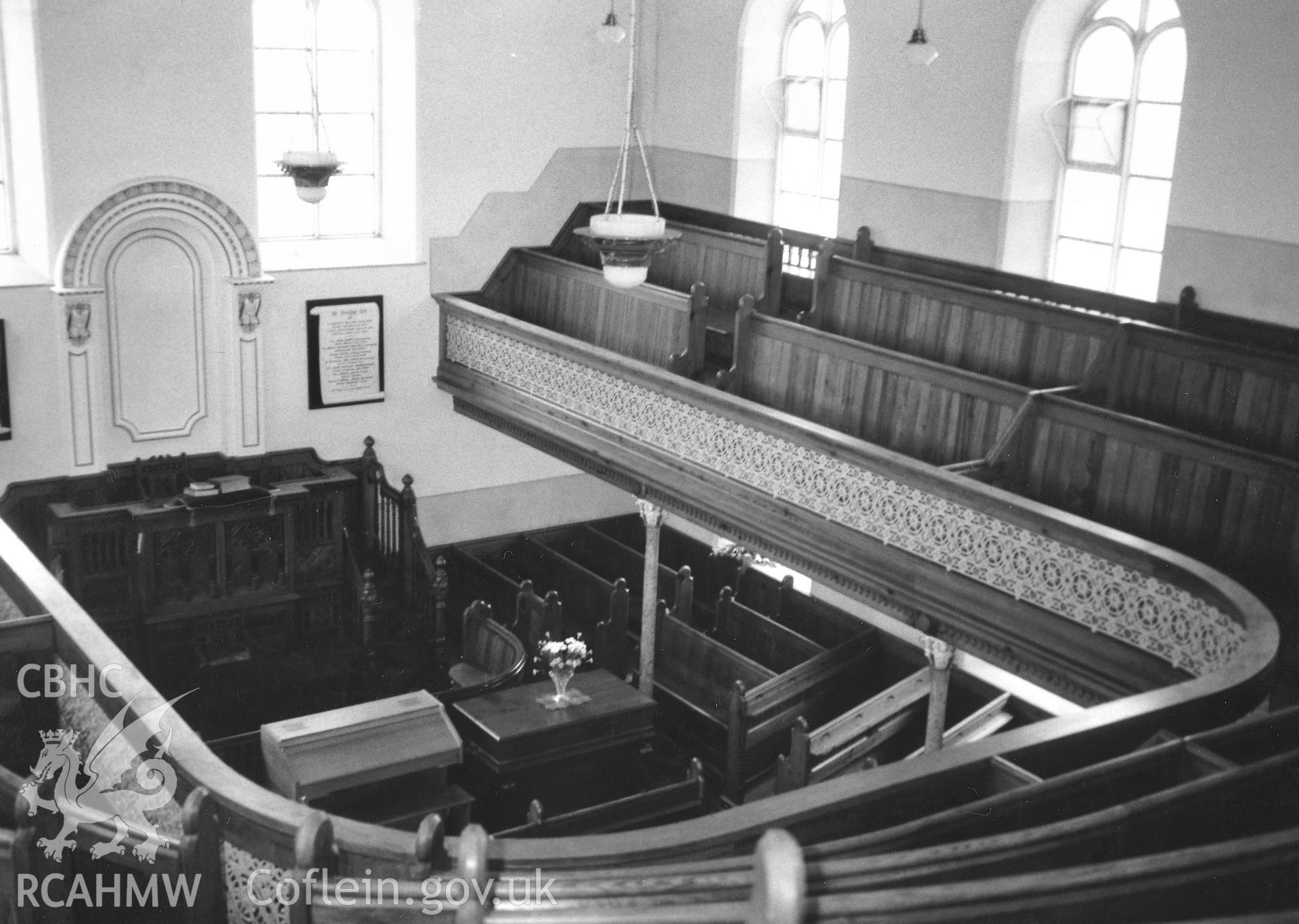 Digital copy of a black and white photograph showing an interior view of Gwernllwyn Independent Chapel, Llandyfriog, taken by Robert Scourfield, 1995.