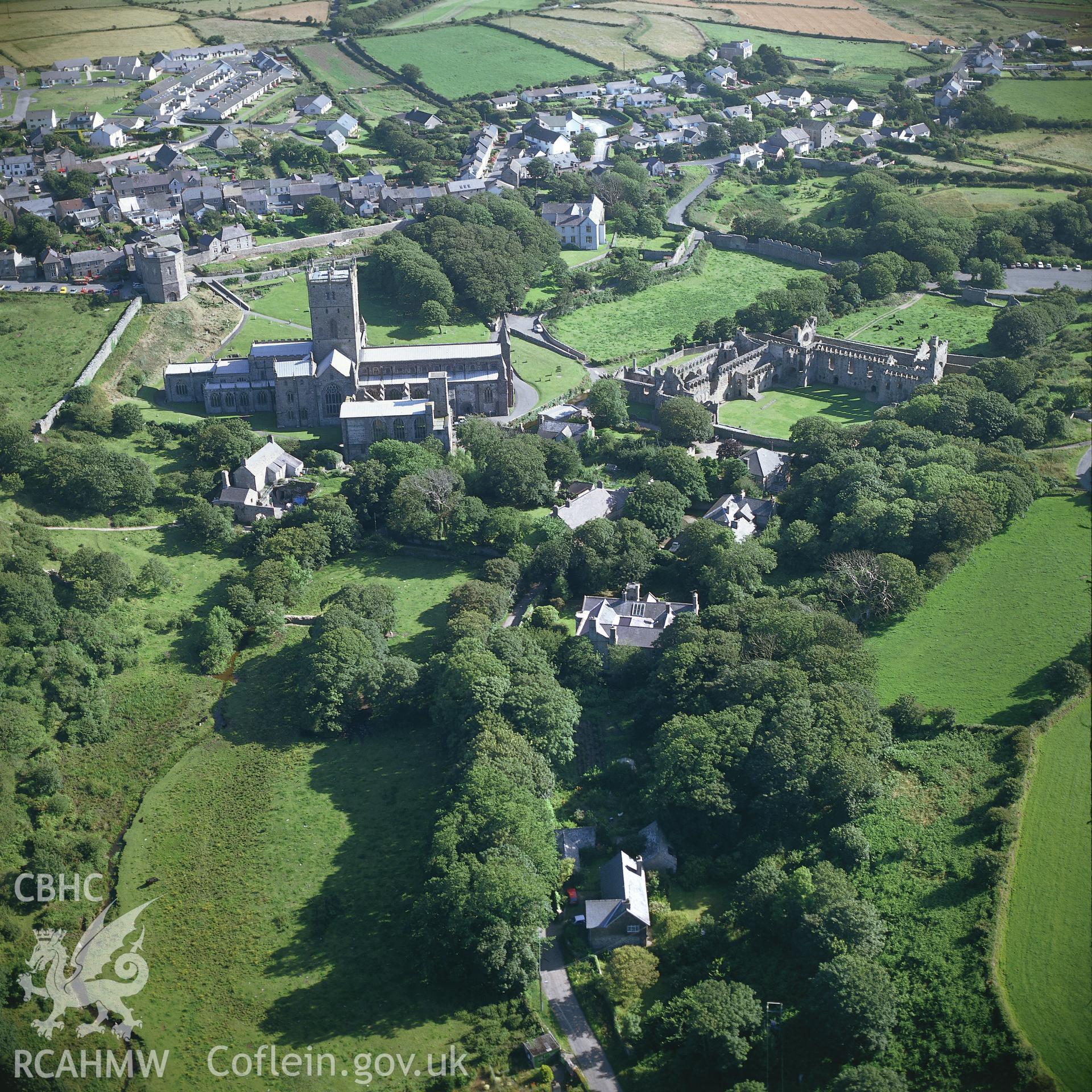RCAHMW colour oblique aerial photograph of St David's Cathedral, taken by C R Musson, 1990.