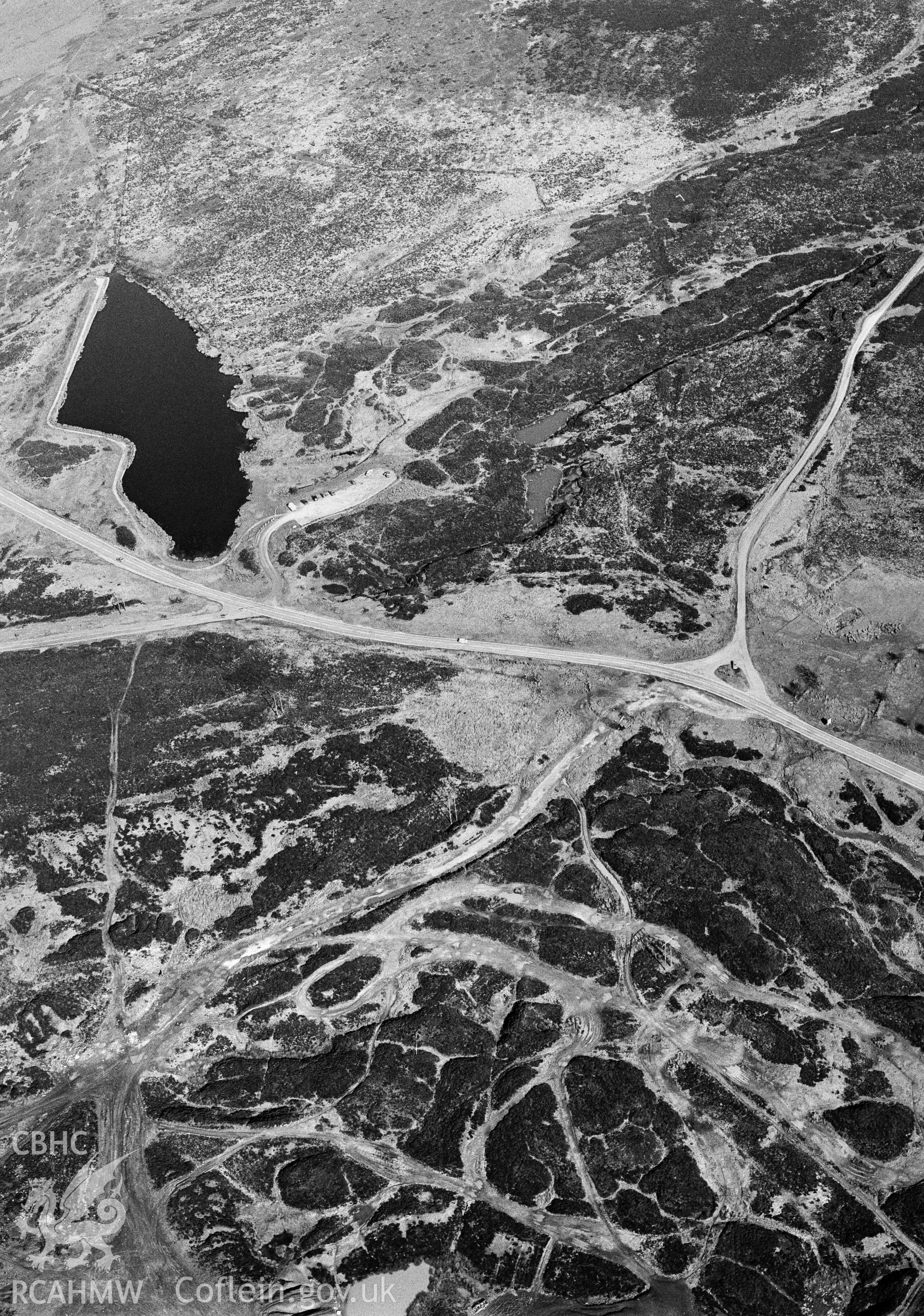 RCAHMW Black and white oblique aerial photograph of Pen-ffordd-goch Iron and Coal Workings, Blaenavon, taken on 15/03/1999 by Toby Driver