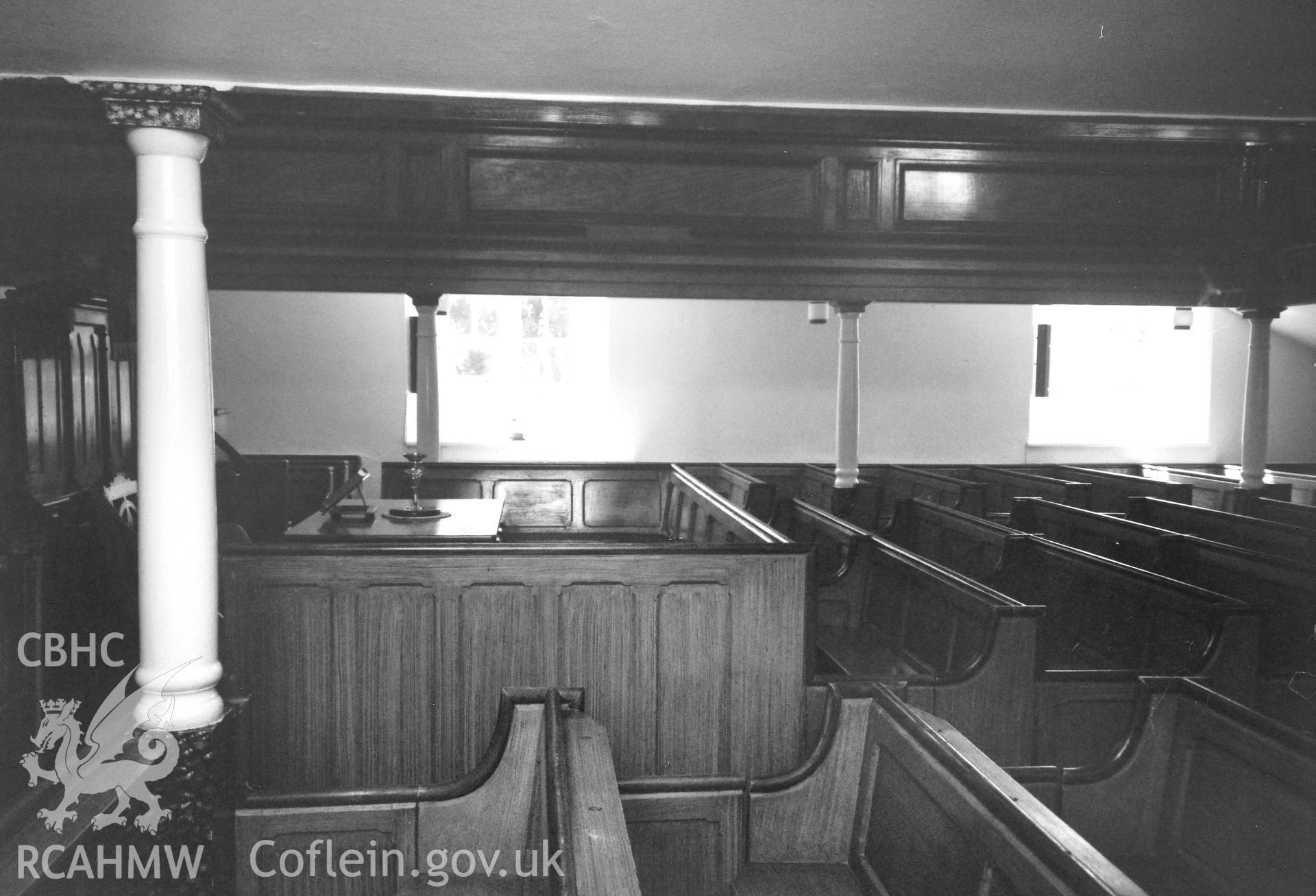 Digital copy of a black and white photograph showing a general interior view of Saron Welsh Baptist Chapel, Letterston, taken by Robert Scourfield, 1996.