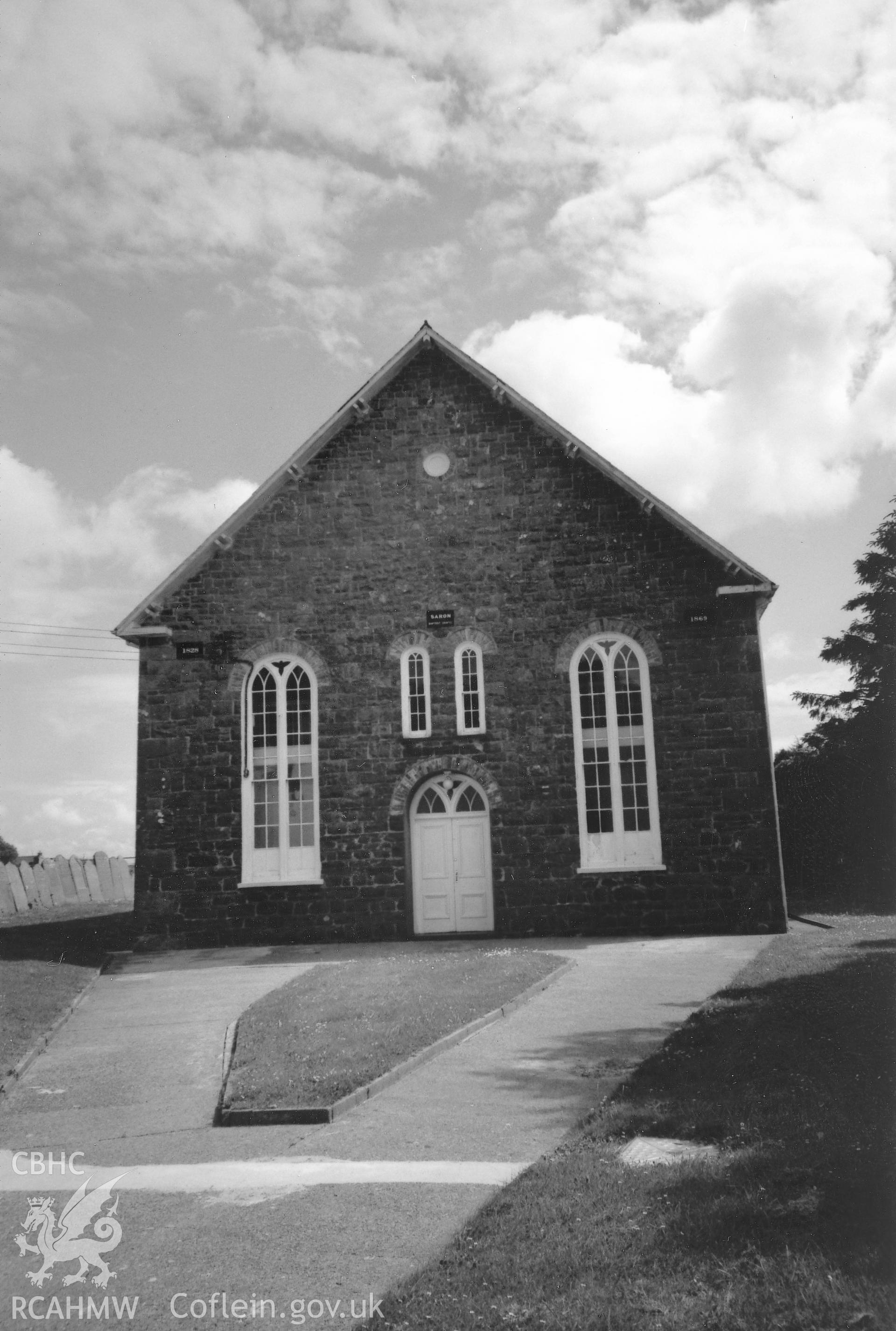 Digital copy of a black and white photograph showing a general view of Saron Welsh Baptist Chapel, Letterston, taken by Robert Scourfield, 1996.