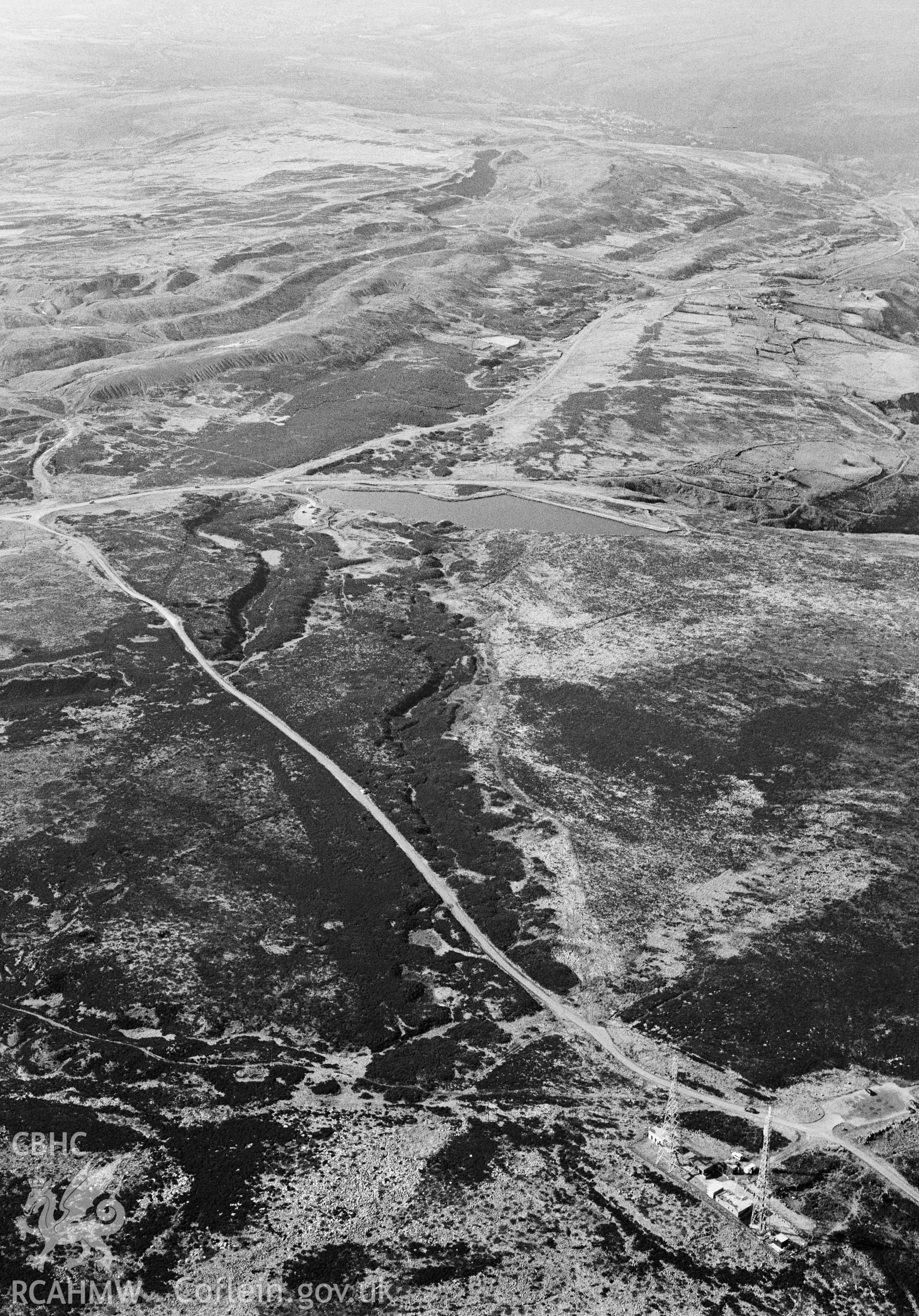 RCAHMW Black and white oblique aerial photograph of Pen-ffordd-goch Iron and Coal Workings, Blaenavon, taken on 15/03/1999 by Toby Driver