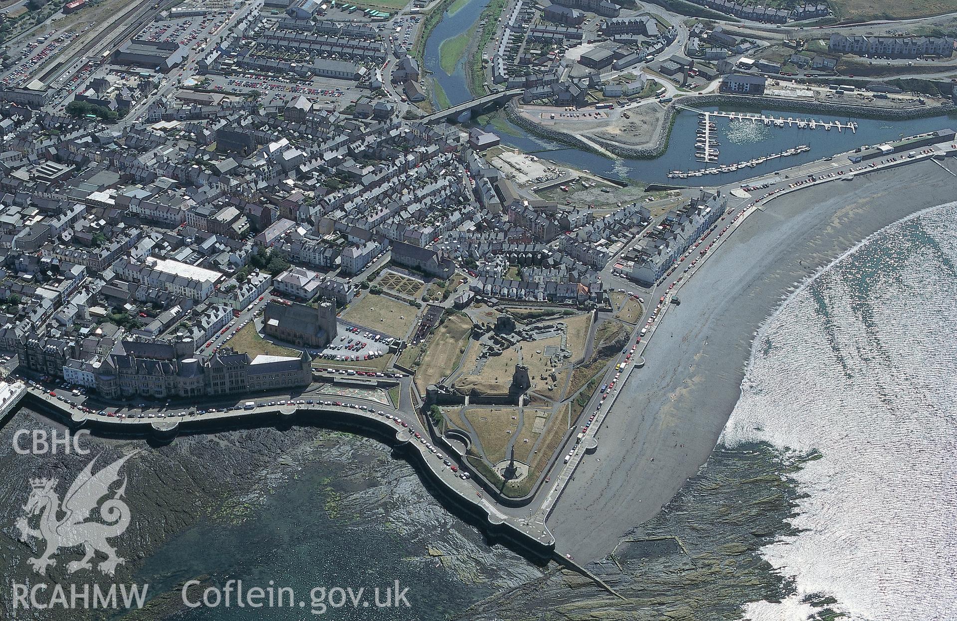 RCAHMW colour oblique aerial photograph of Aberystwyth Castle. Taken by C R Musson on 09/08/1995