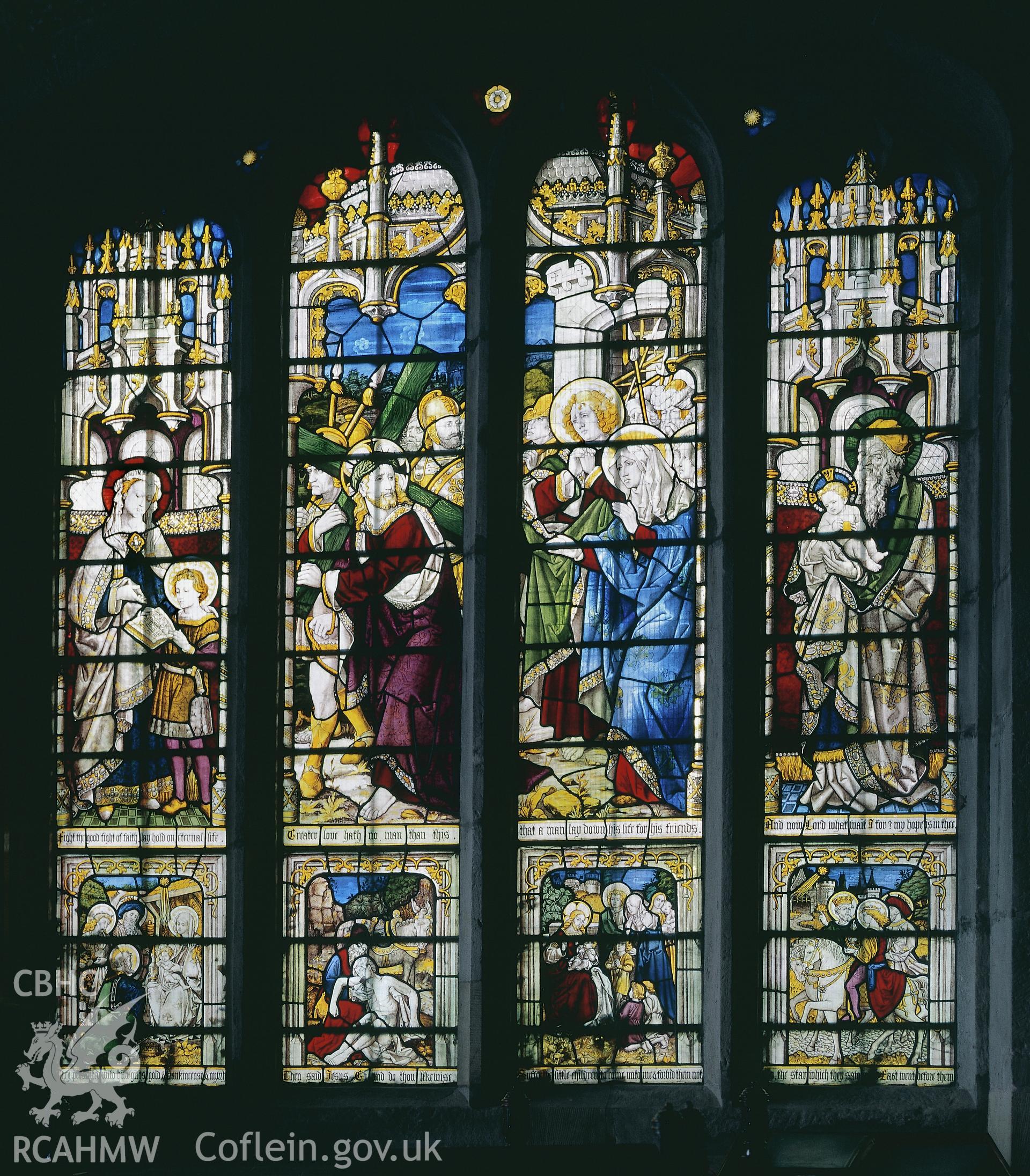 RCAHMW colour transparency of a stained glass window depicting the crucifiction as the centre panel  in St. Dyfnog's Church, Llanrhaeadr-yng-Nghinmeirch, by Fleur James, 1986.