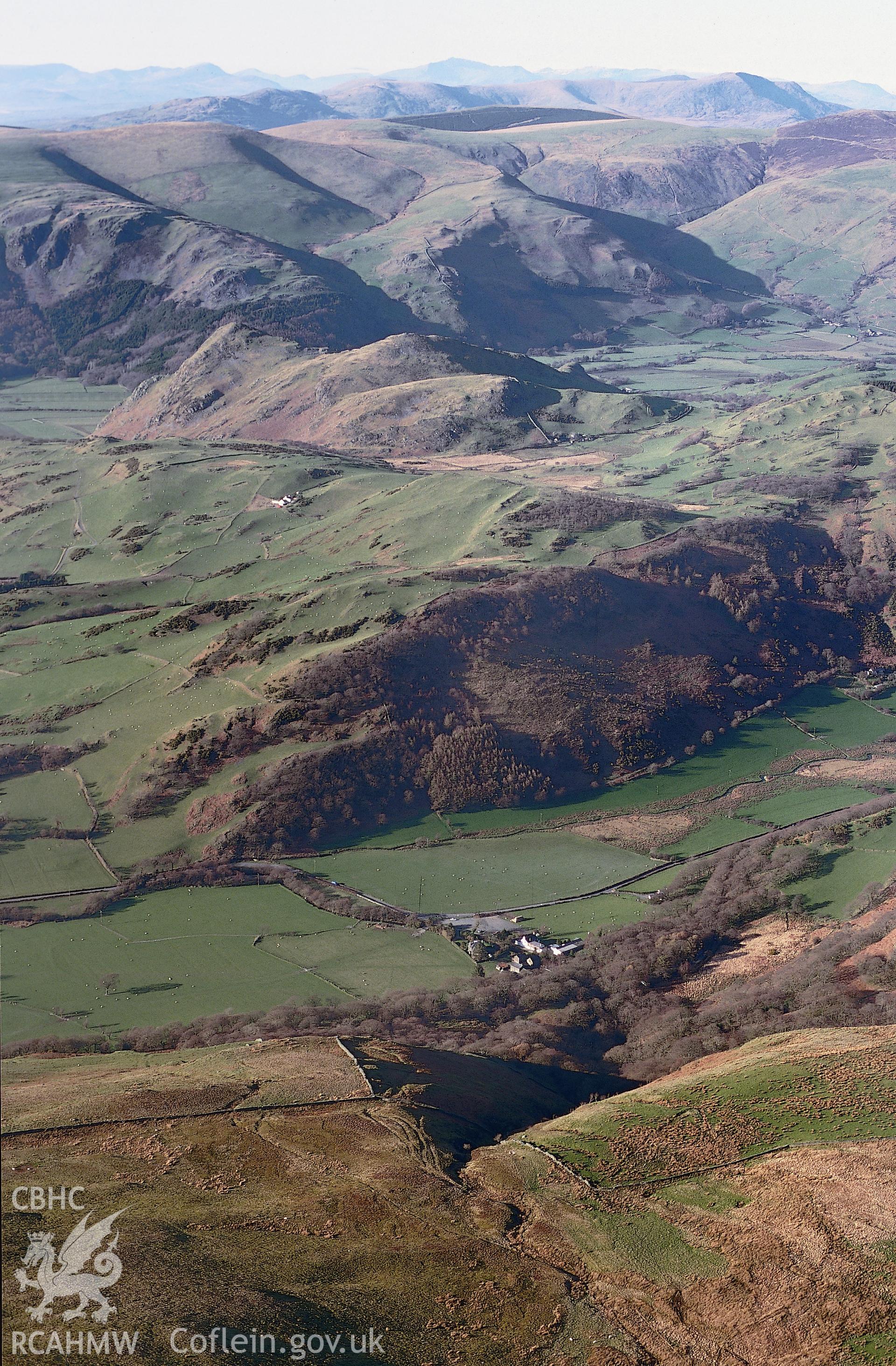 RCAHMW colour slide oblique aerial photograph of the Dolgoch landscape north-east to Tal-y-llyn, showing Craig-yr-Aderyn, taken on 17/03/1999 by Toby Driver