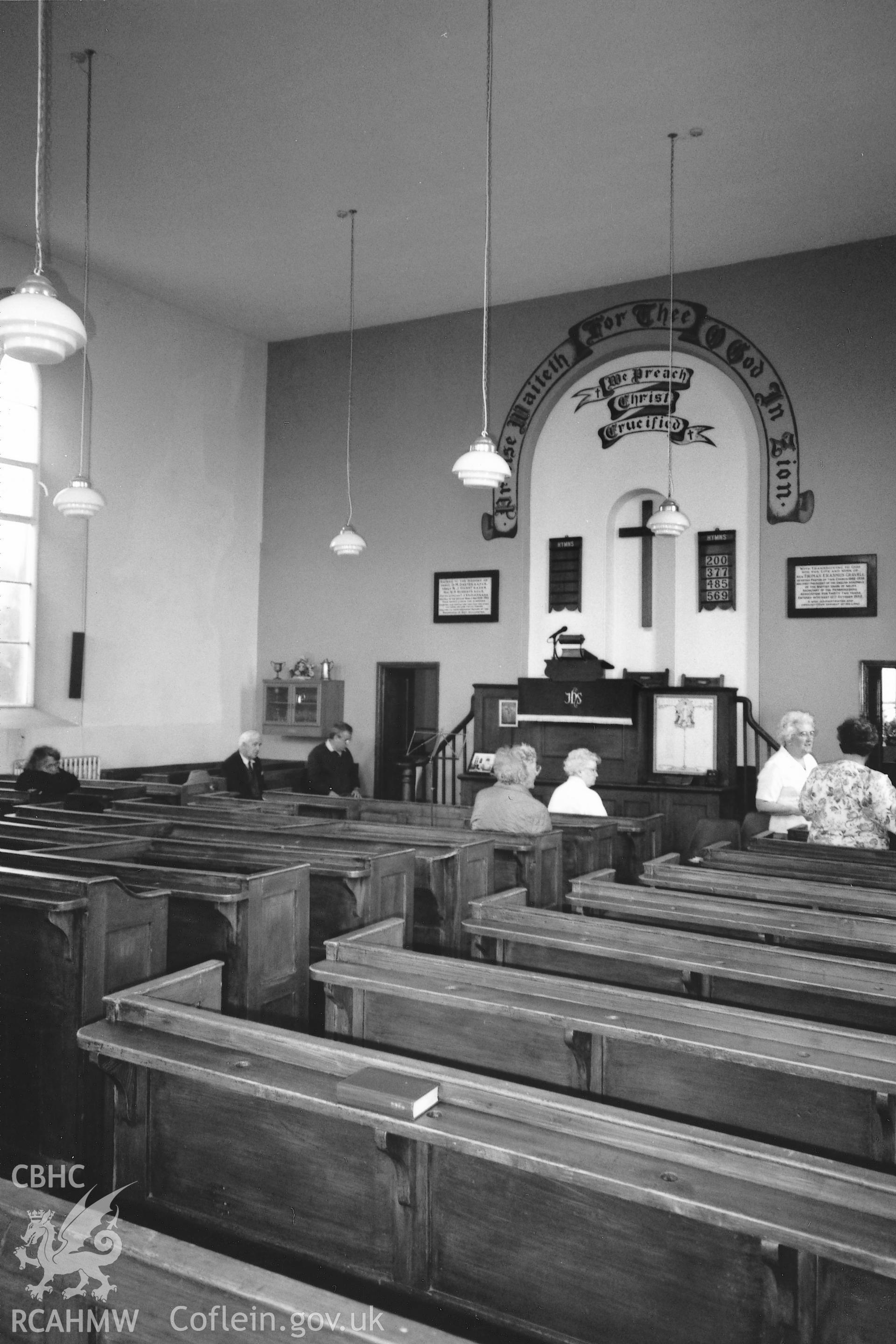 Digital copy of a black and white photograph showing a general interior view of Ebenezer Baptist Chapel, Cold Inn, taken by Robert Scourfield, 1996.