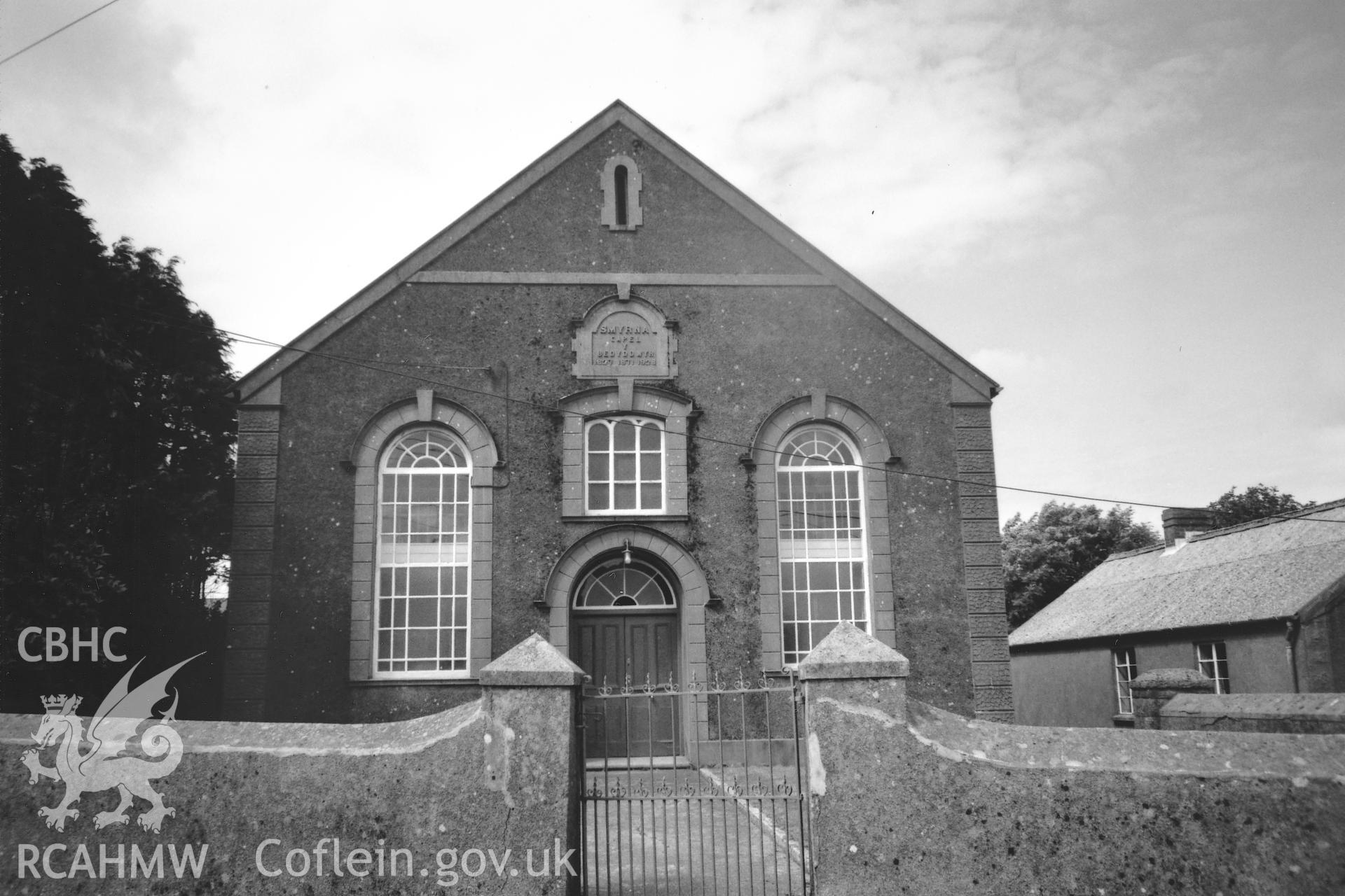Digital copy of a black and white photograph showing a view of Smyrna Baptist Chapel, Puncheston, taken by Robert Scourfield, 1996.