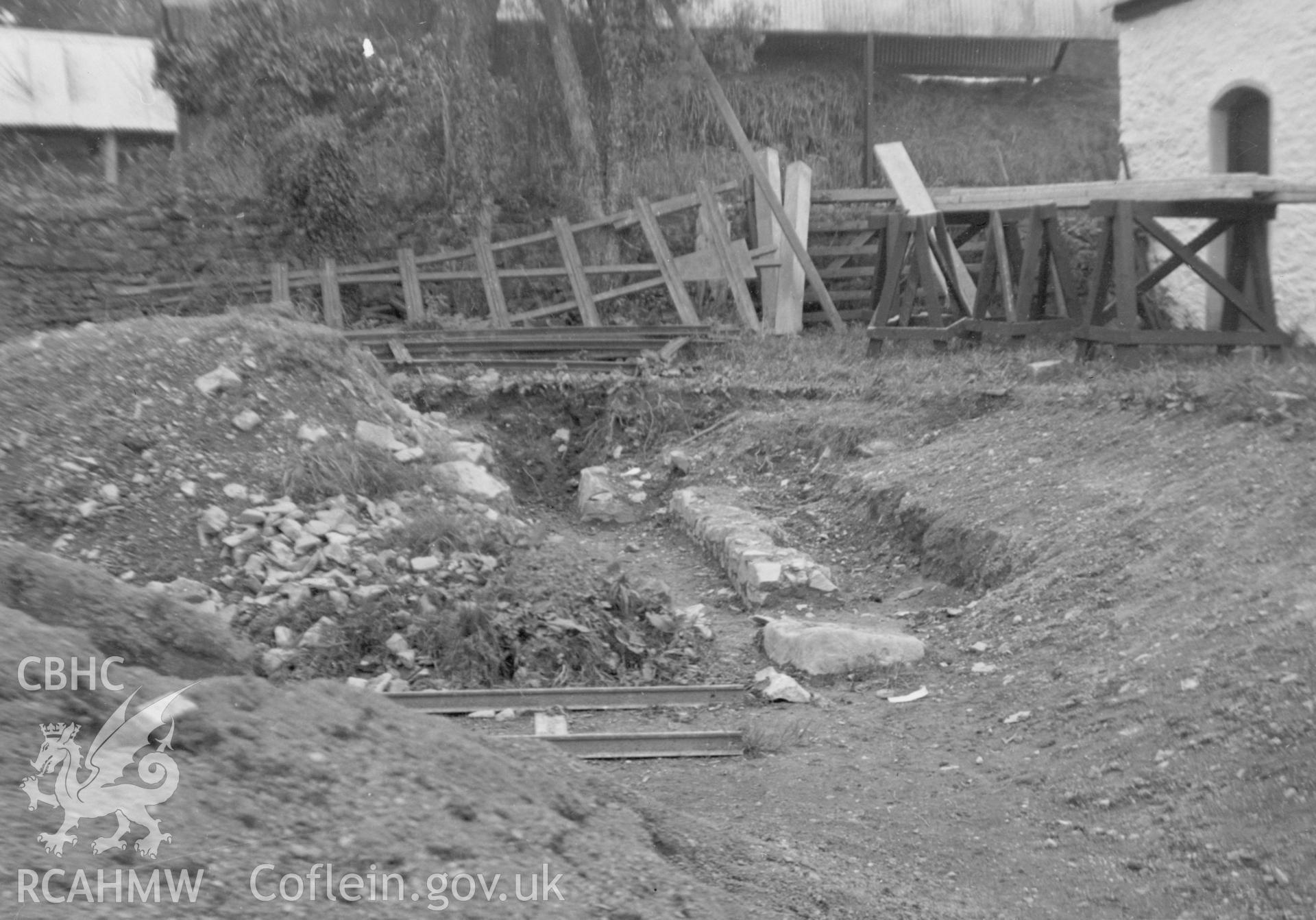 View of wall foundations during excavation at Talley Abbey.