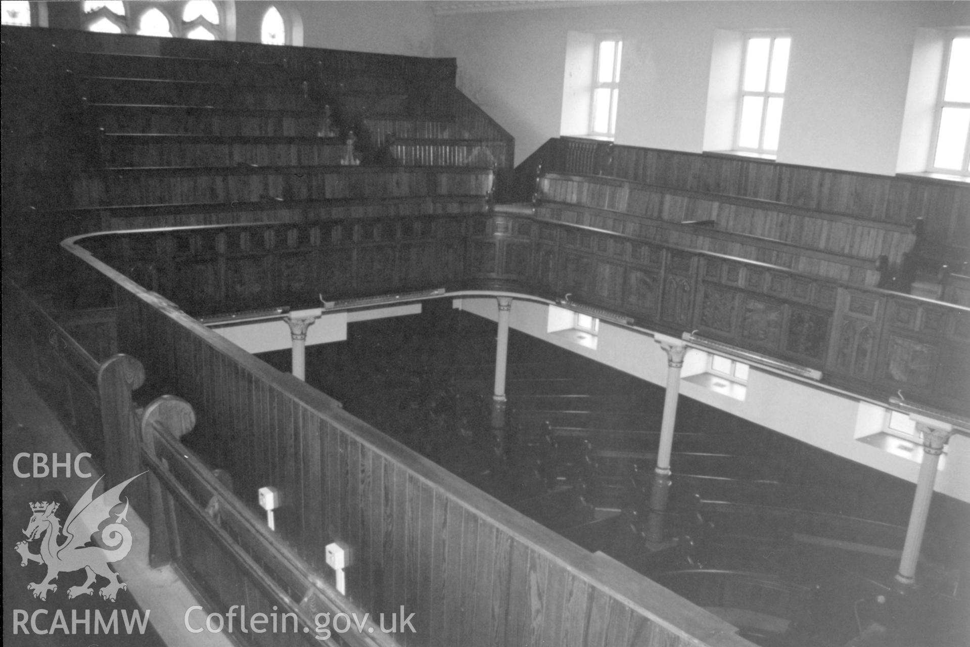 Digital copy of a black and white photograph showing an interior view of Ebenezer Welsh Independent Chapel, Abergwili, taken by Robert Scourfield, 1996.