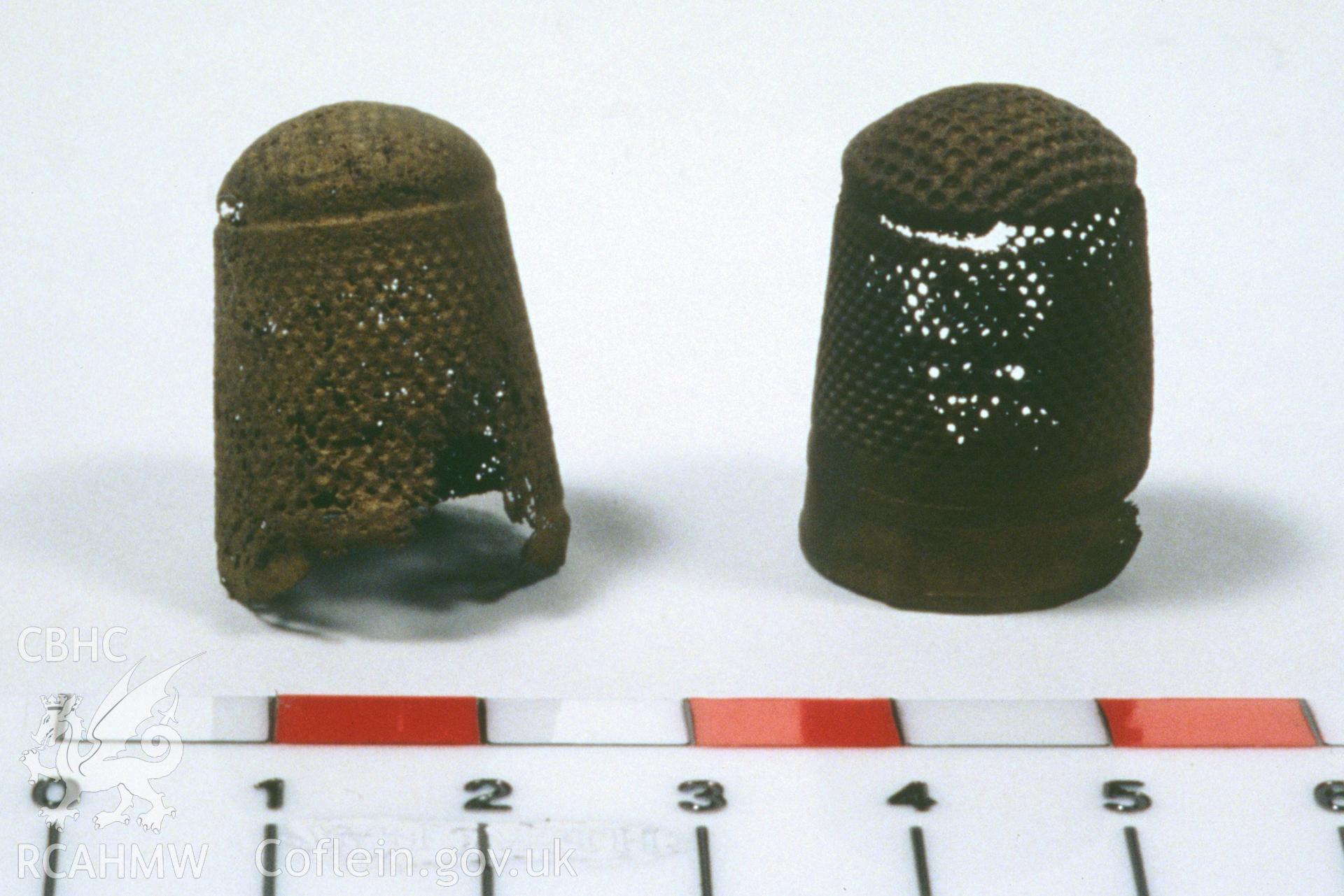 Colour slide showing find from site, a pair of thimbles, from a survey of the Mary designated shipwreck, courtesy of National Museums, Liverpool (Merseyside Maritime Museum)