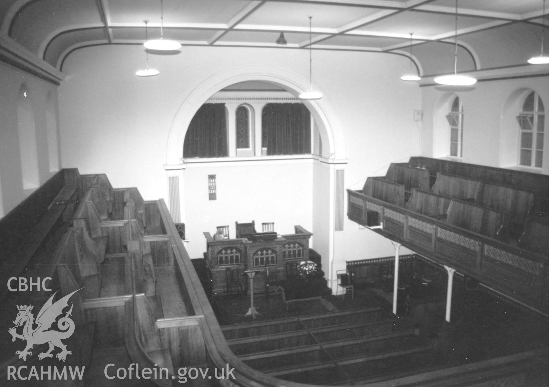 Digital copy of a black and white photograph showing an interior view of Hill Park Baptist Chapel, Haverfordwest, taken by Robert Scourfield, c.1996.