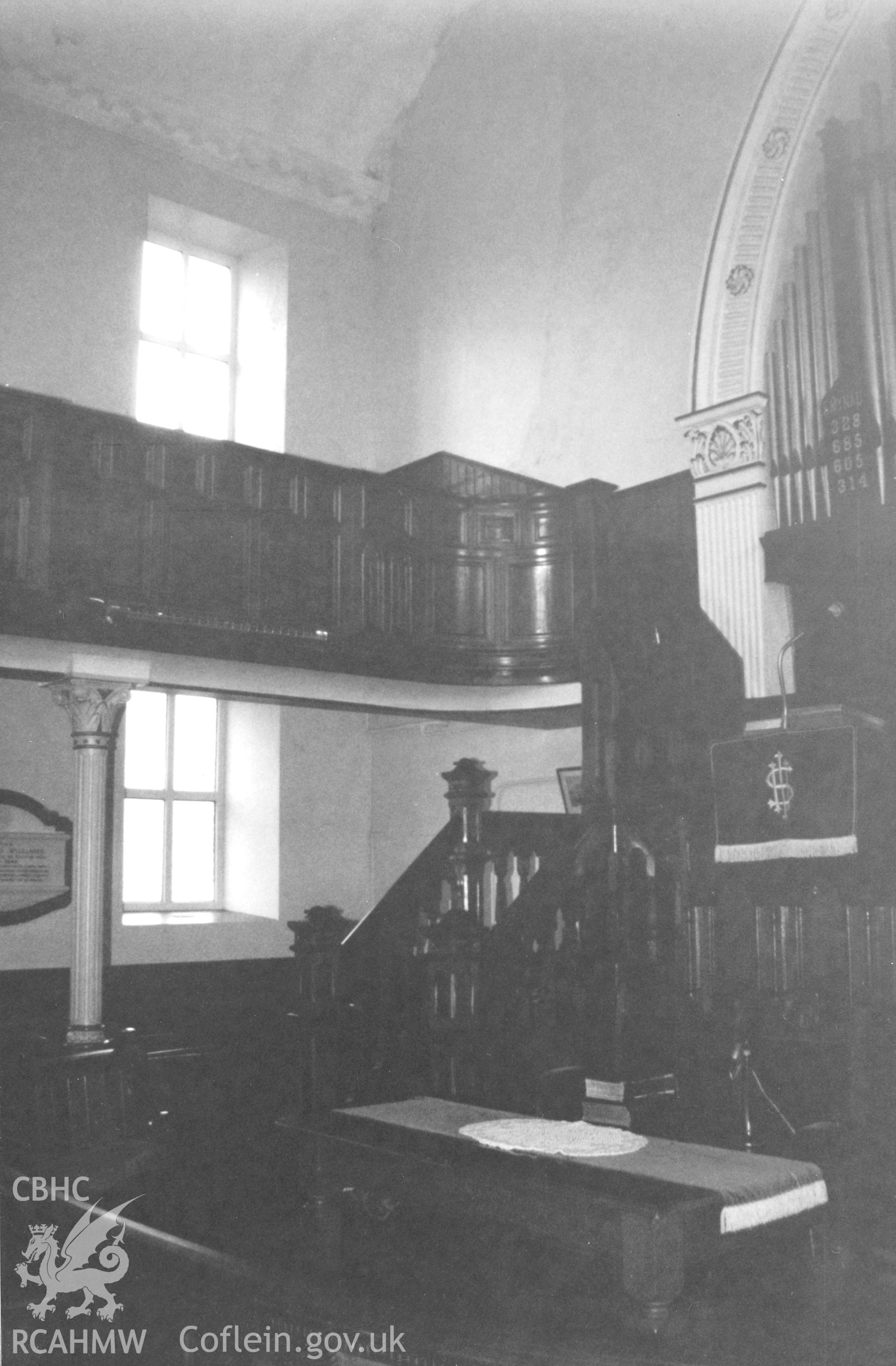 Digital copy of a black and white photograph showing an interior view of Ebenezer Welsh Independent Chapel, Abergwili, taken by Robert Scourfield, 1996.