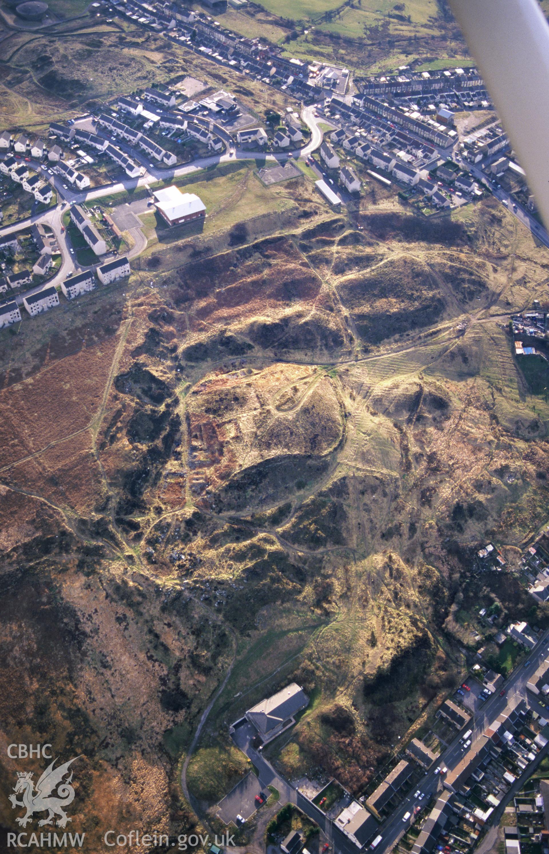 Slide of RCAHMW colour oblique aerial photograph showing a quarry near Trebanog, taken by T.G. Driver, 2001.
