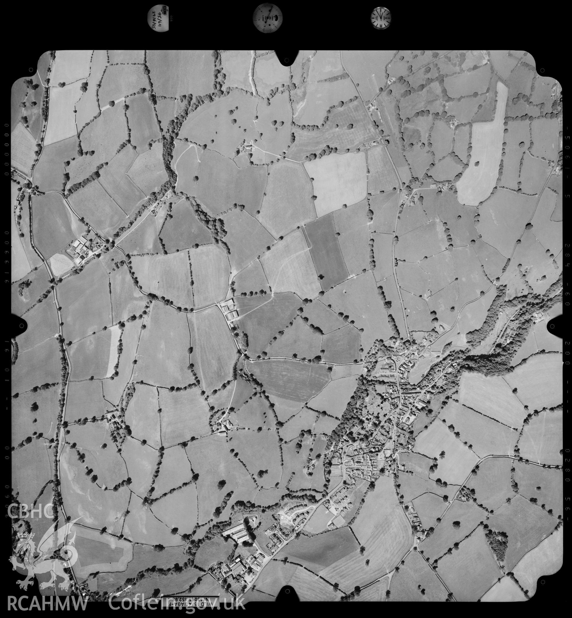 Digitized copy of an aerial photograph showing Llanrhaiadr ym Mochnant area, taken by Ordnance Survey, 1995.