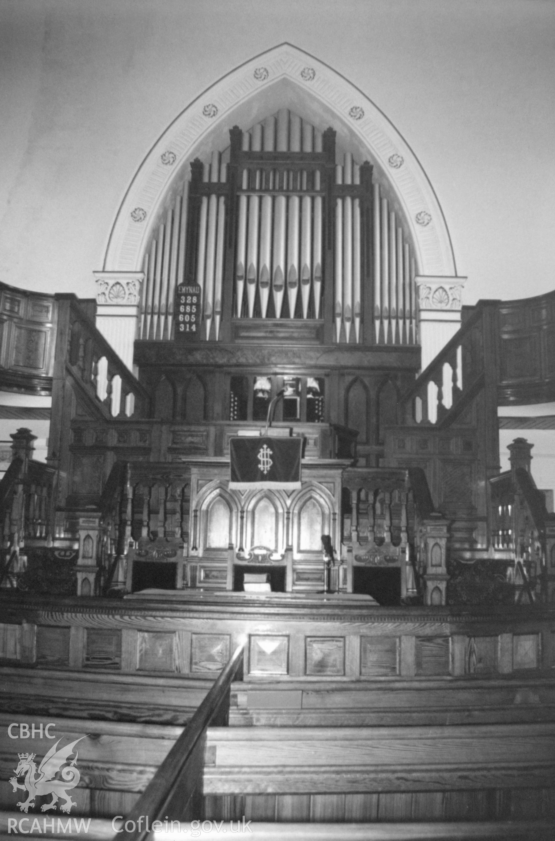 Digital copy of a black and white photograph showing an interior view of Ebenezer Welsh Independent Chapel, Abergwili, taken by Robert Scourfield, 1996.