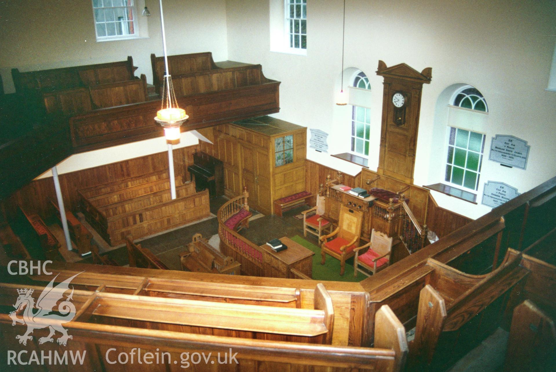 Digital copy of a colour photograph showing an interior view of the Rhiw-bwys Welsh Calvinistic Methodist Chapel,  taken by Robert Scourfield, c.1996.