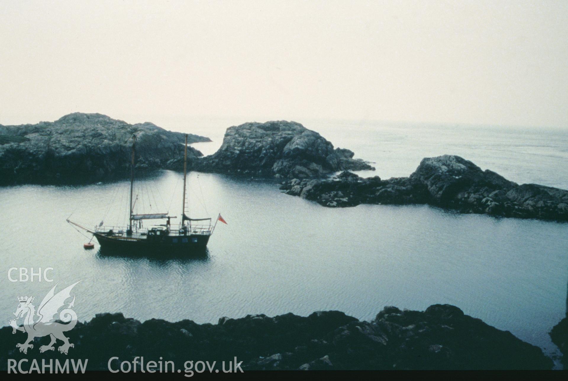 Colour slide of a general view of the Skerries in the vicinity of the wreck site, showing sailing vessel, from a survey of the Mary designated shipwreck, courtesy of National Museums, Liverpool (Merseyside Maritime Museum)