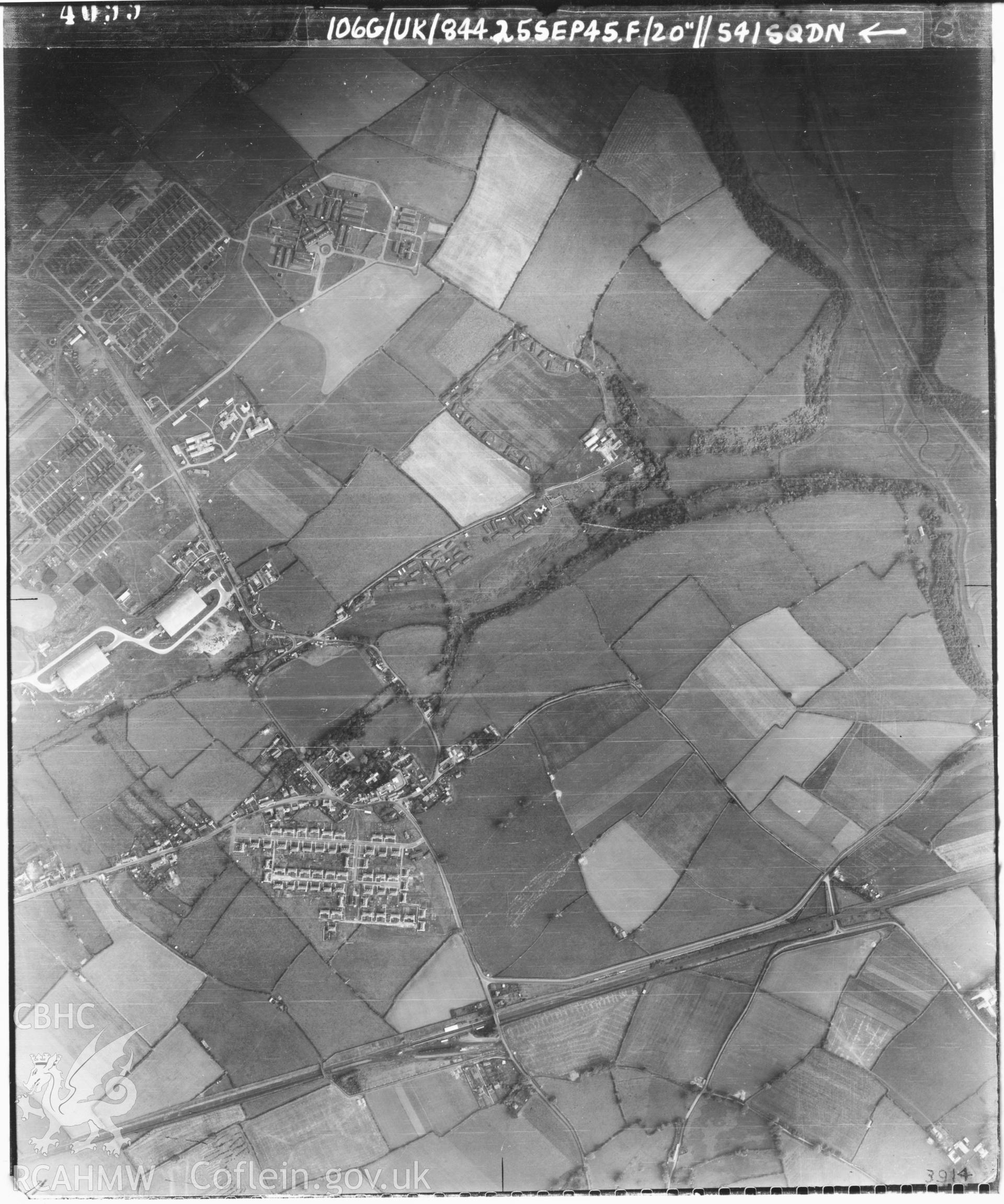 Black and white vertical aerial photograph taken by the RAF on 25/09/1945 centred on ST02006828 at a scale of 1:10000. The photograph includes part of St Athan community in The Vale of Glamorgan.