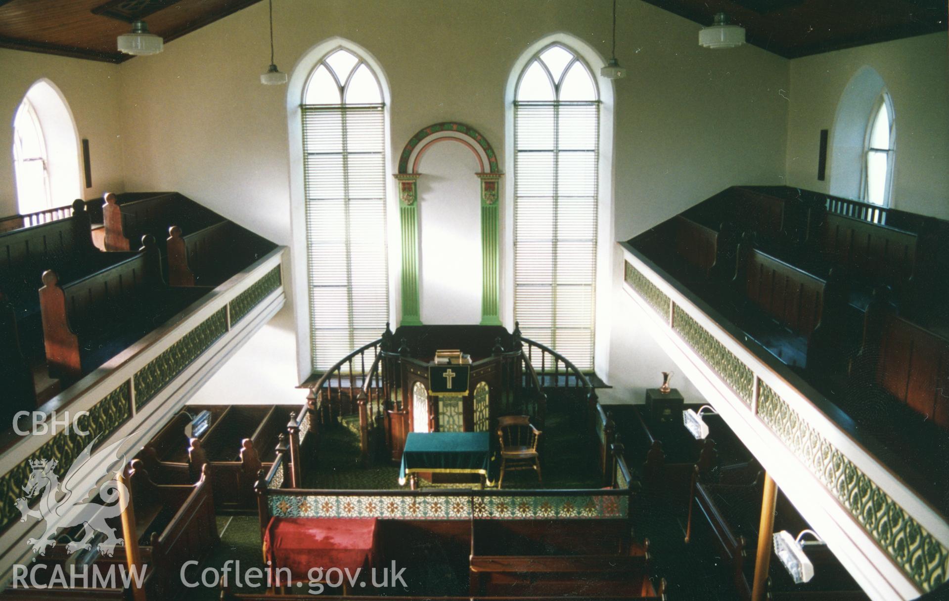 Digital copy of a colour photograph showing an interior view of Seion Chapel, Pumpsaint, taken by Robert Scourfield, c.1996.