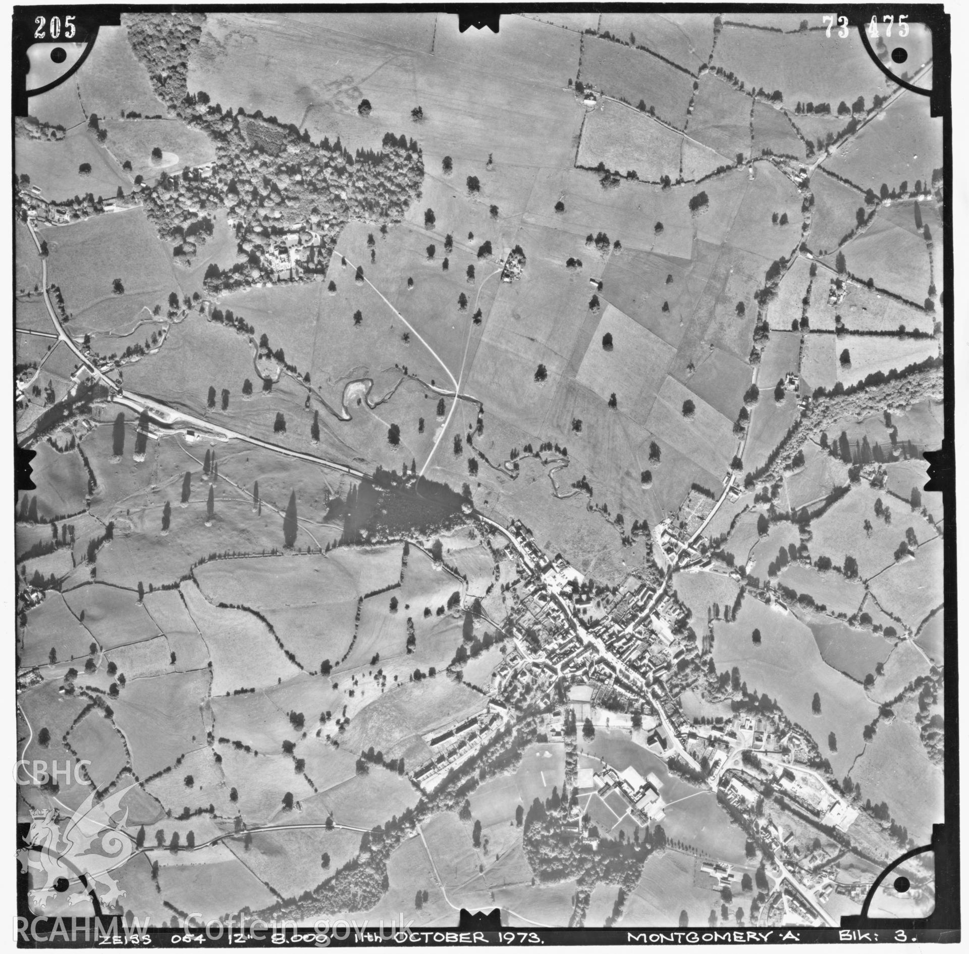 Digitized copy of an aerial photograph showing the area around Llanfyllin, taken by Ordnance Survey, 1973.