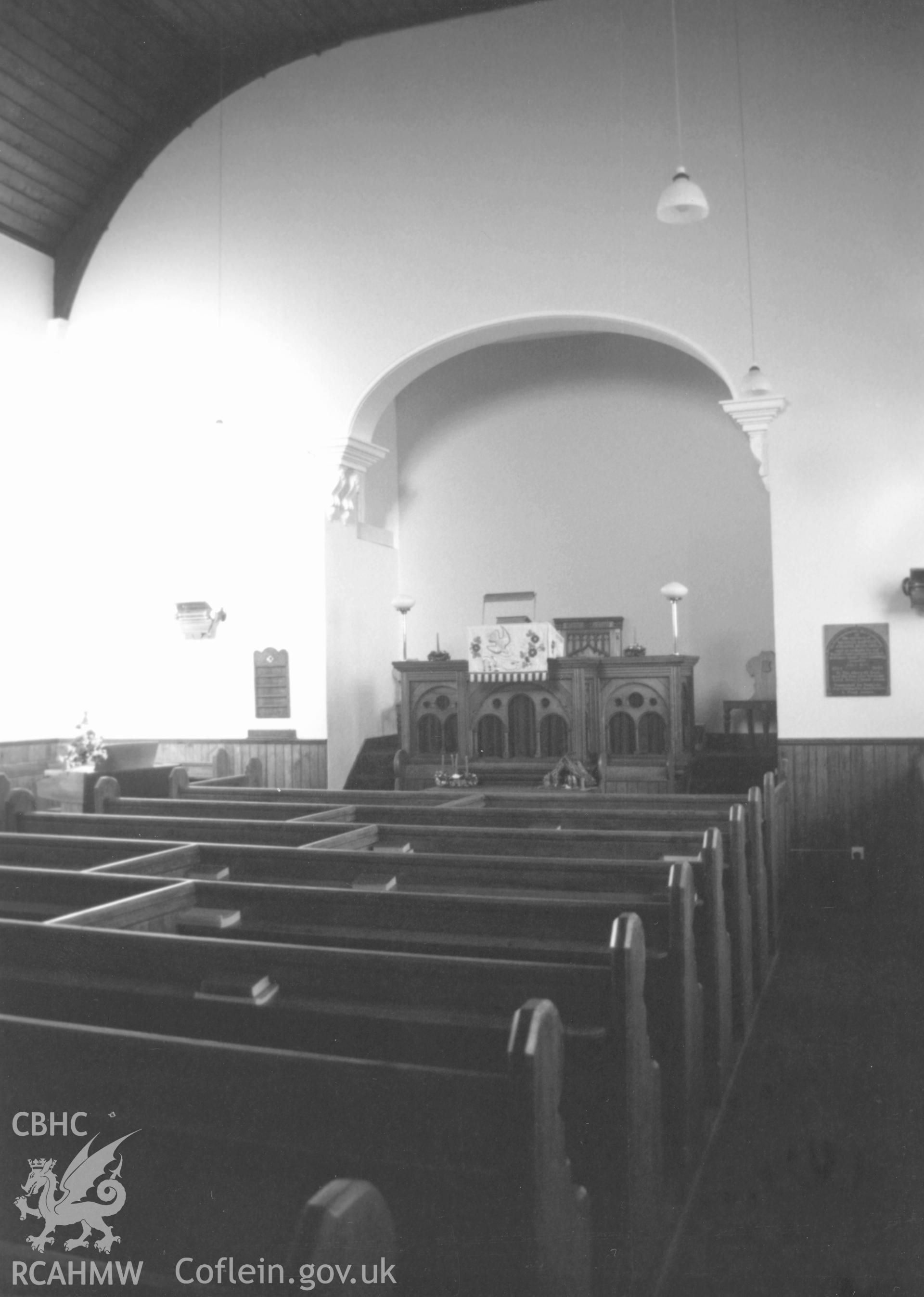 Digital copy of a black and white photograph showing an interior view of Moriah English Baptist Church, Marloes, taken by Robert Scourfield, c.1996.