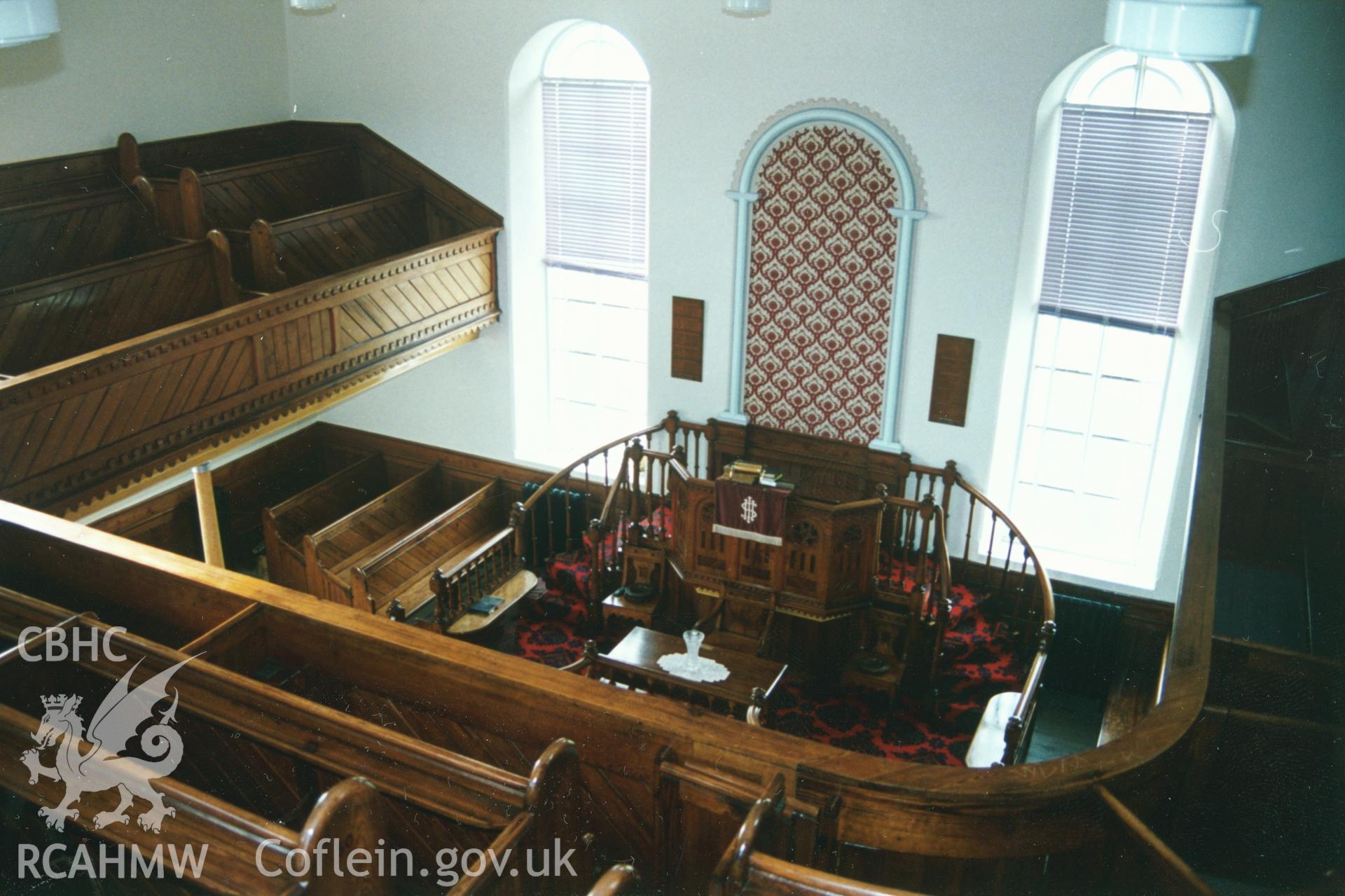 Digital copy of a colour photograph showing an interior view of Crug y Bar Welsh Independent Chapel, taken by Robert Scourfield, c.1996.