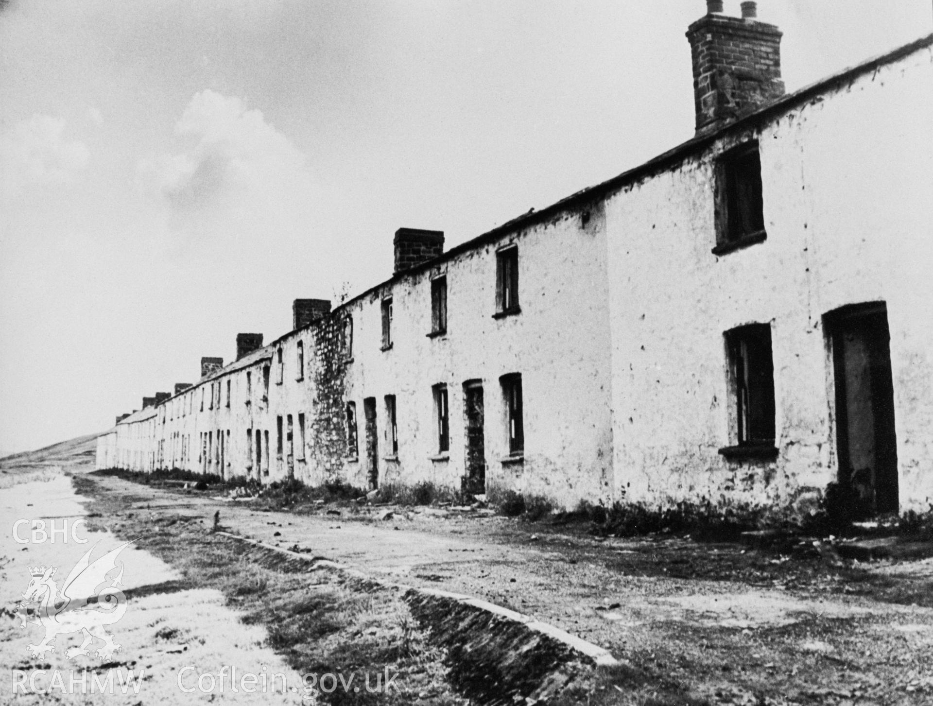 Back Row, Onllwyn; black and white photograph copied from an undated original loaned by Colin Grist.