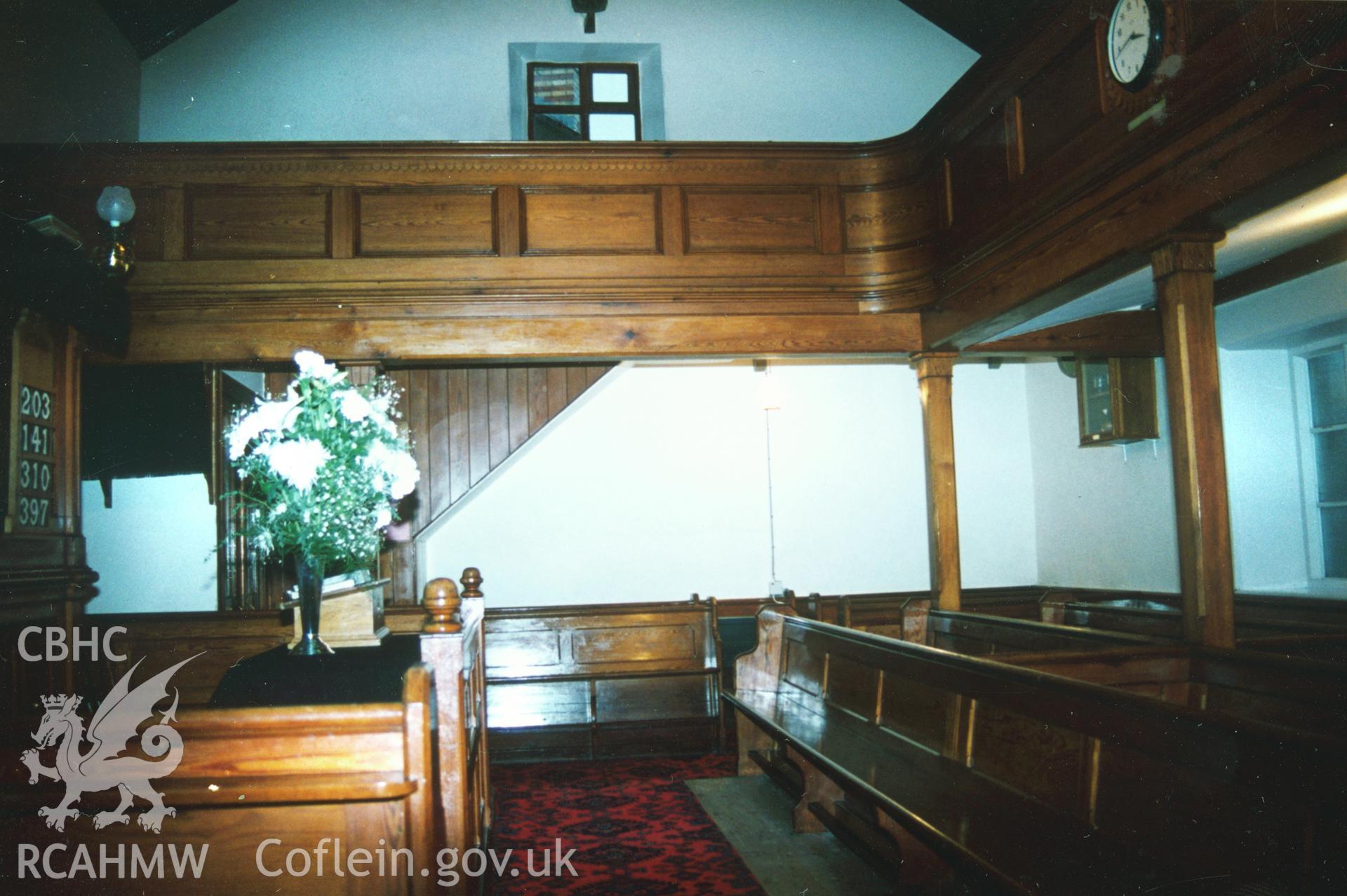 Digital copy of a colour photograph showing an interior view of Cribyn Welsh Unitarian Chapel,  taken by Robert Scourfield, c.1996.