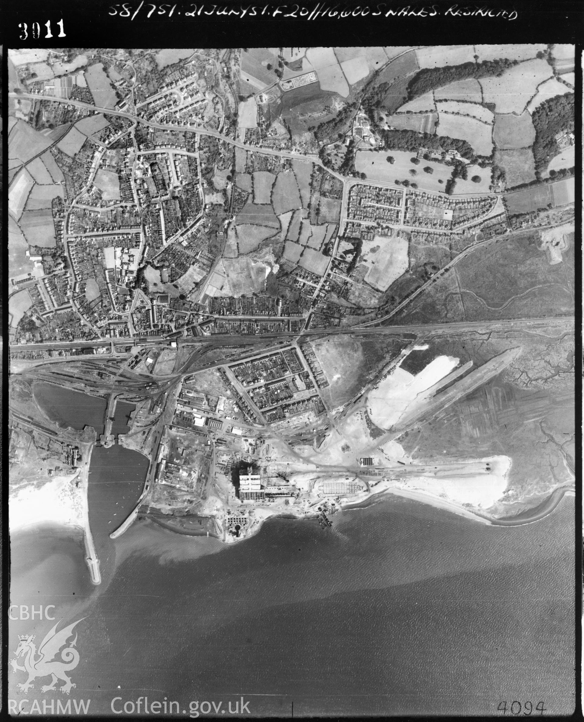 Black and white vertical aerial photograph taken by the RAF on 21/07/1951 centred on SN45350072 at a scale of 1:10000. The photograph includes Burry Port and part of Cefn Sidan community in Carmarthenshire.