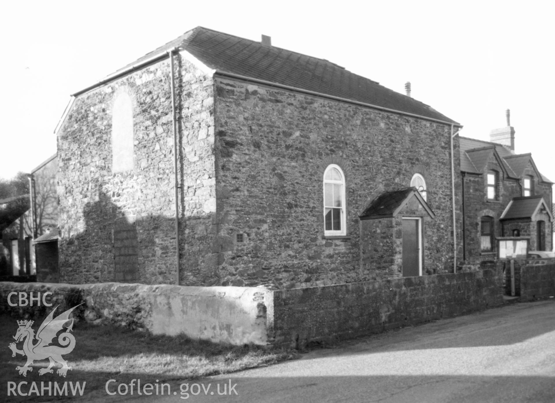 Digital copy of a black and white photograph showing an exterior view of Marloes Wesleyan Methodist Chapel taken by Robert Scourfield, 1996.