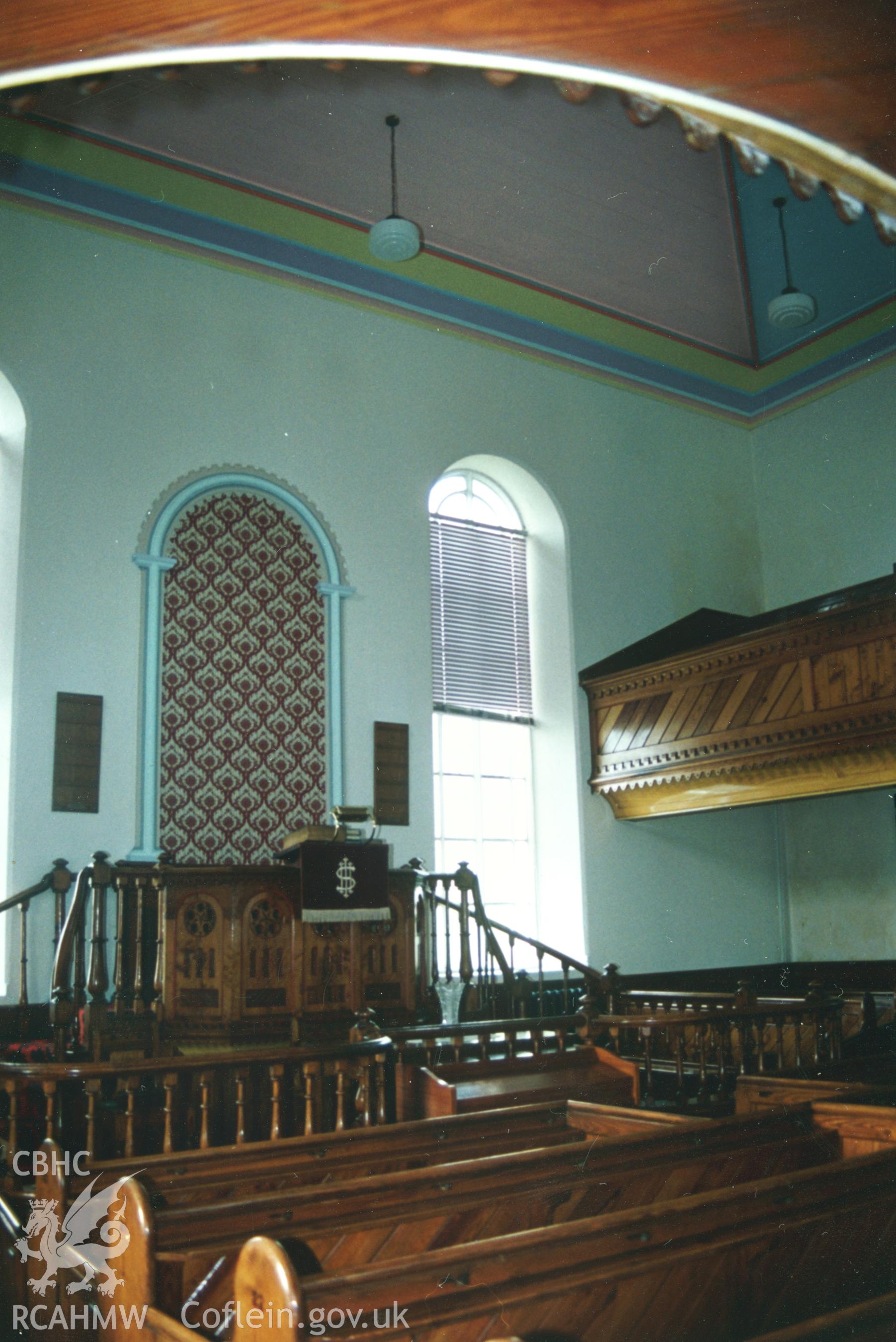 Digital copy of a colour photograph showing an interior view of Crug y Bar Welsh Independent Chapel, taken by Robert Scourfield, c.1996.